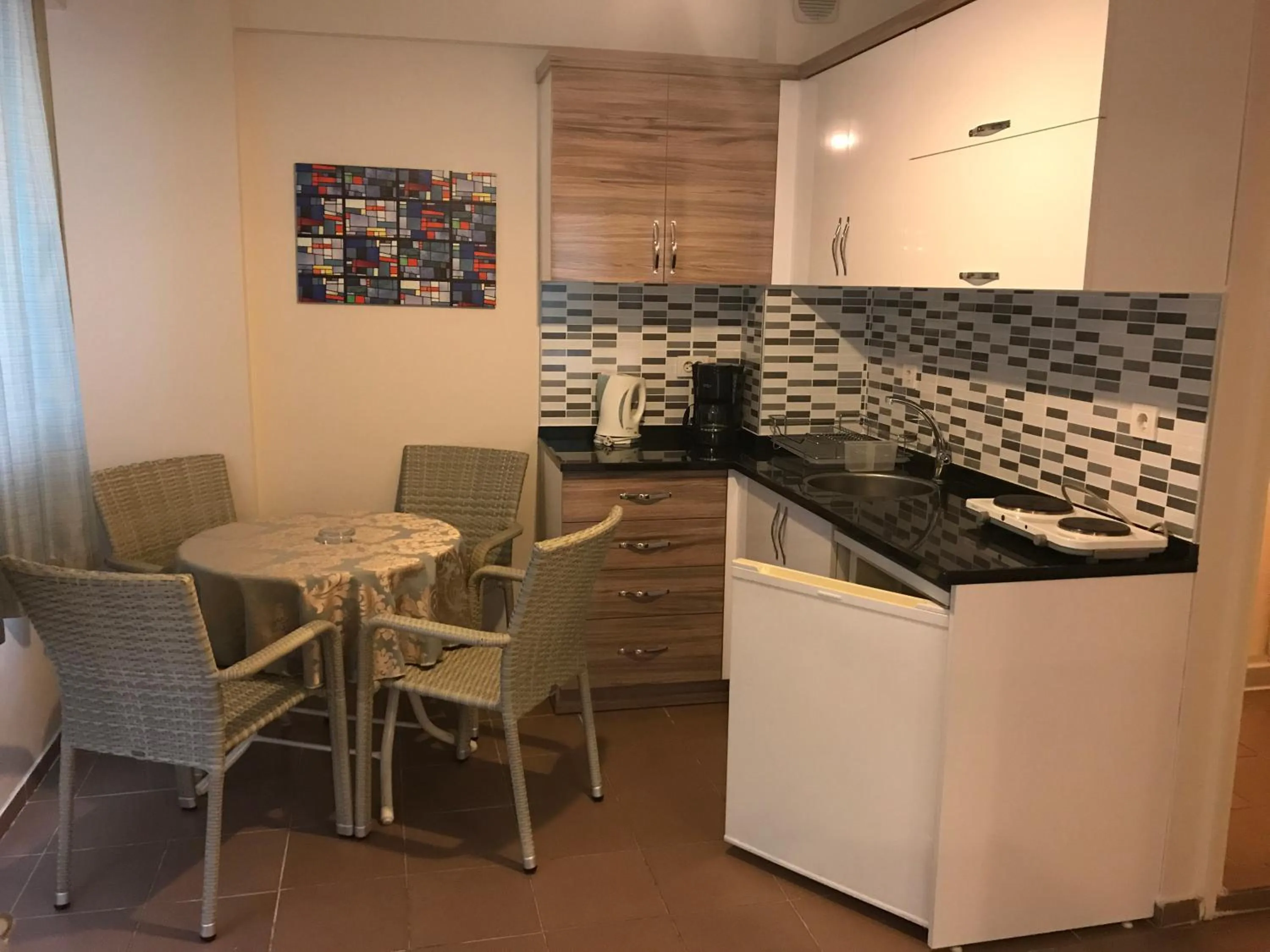 Kitchen or kitchenette in Narcis Apart Hotel