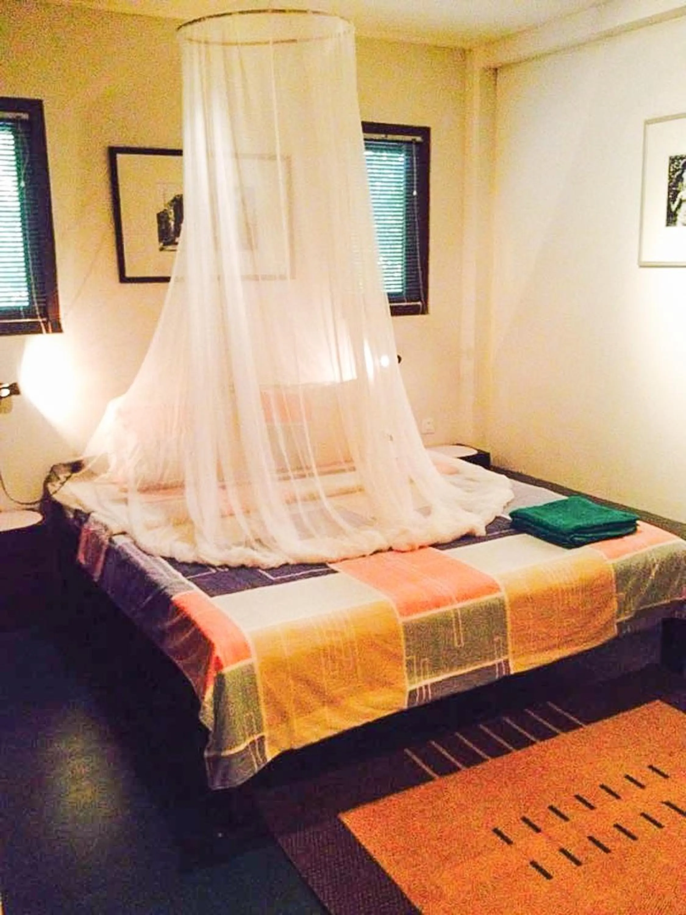 Bed in The Cockatoo Nature Resort & Spa