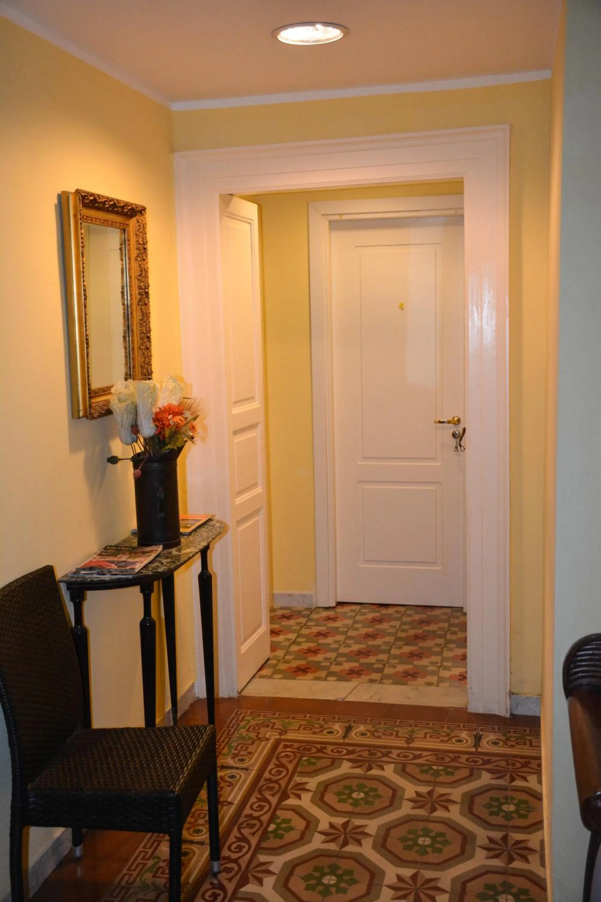 Communal lounge/ TV room in B&B Le Colonne