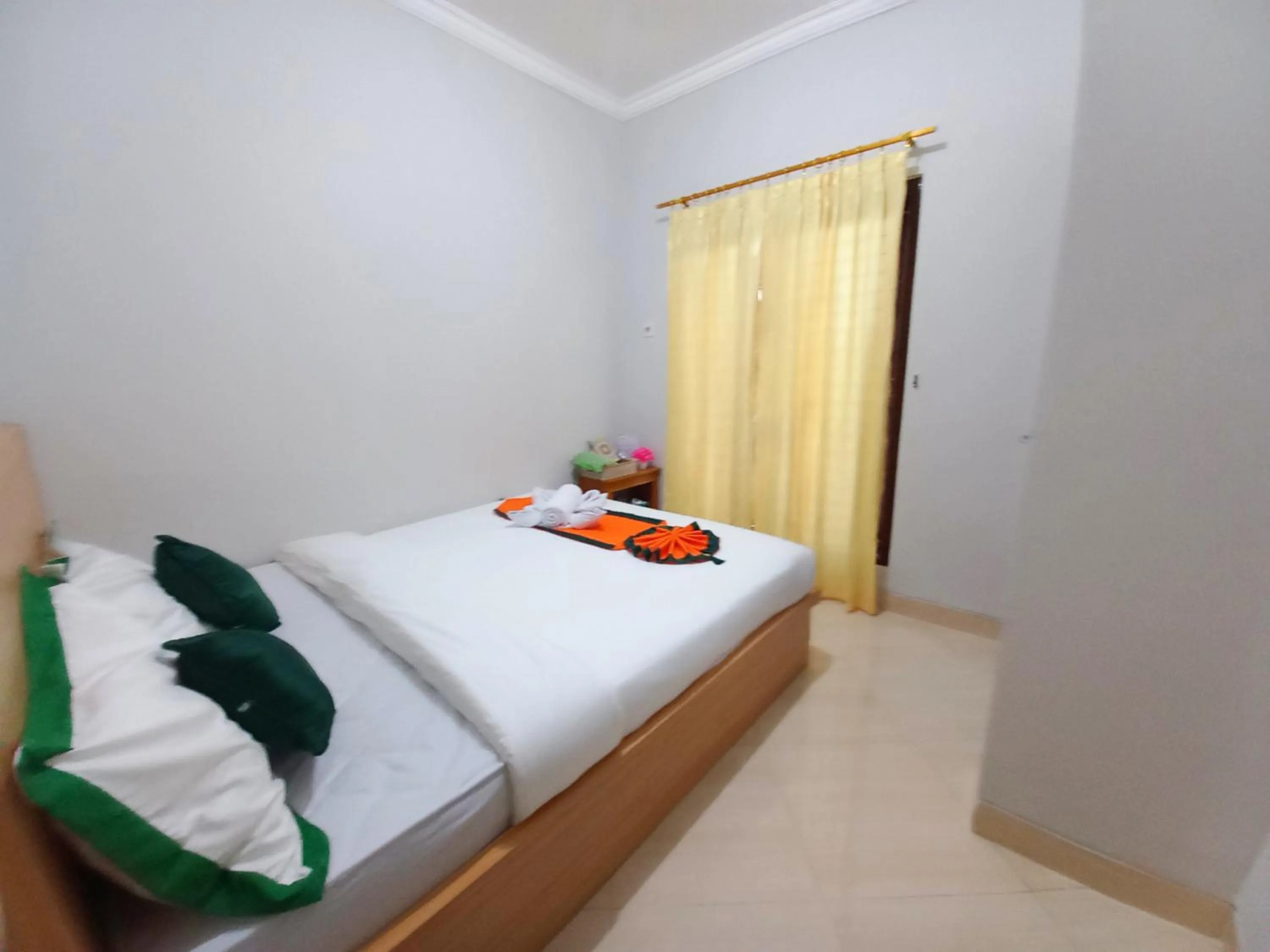 Bed in Homestay Syariah Dekat Monjali dan Jogja City Mall by Simply Homy