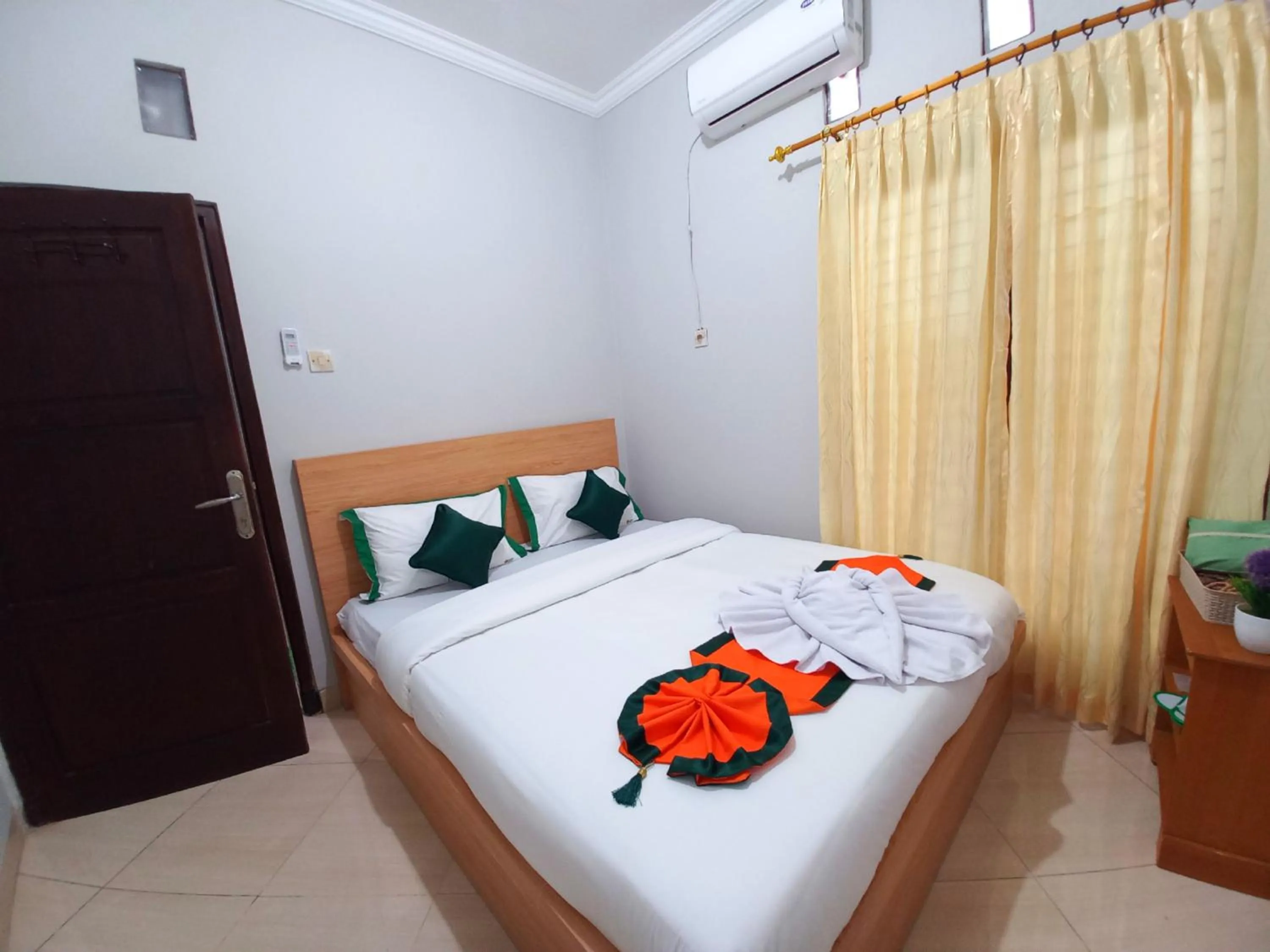 Bed in Homestay Syariah Dekat Monjali dan Jogja City Mall by Simply Homy