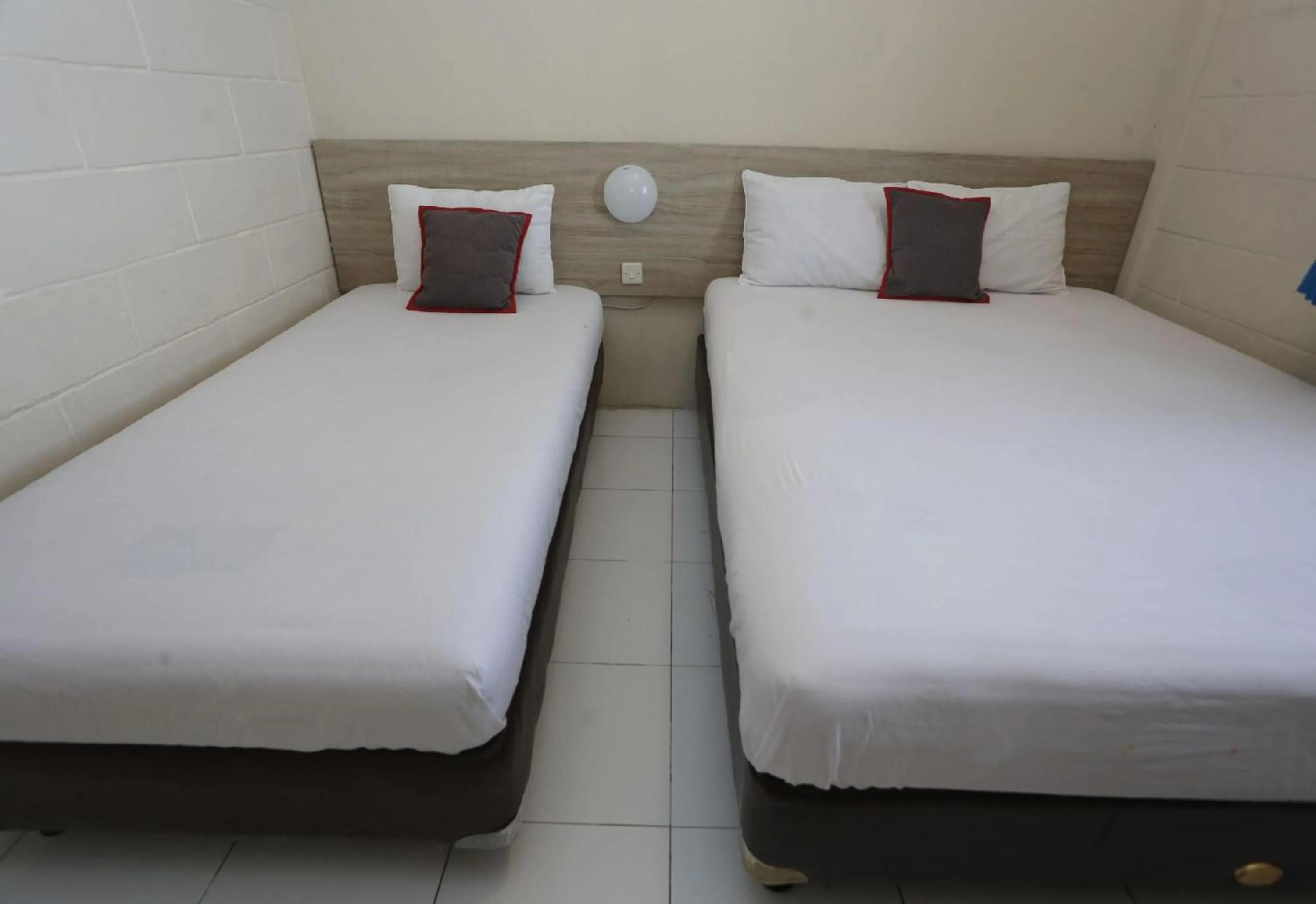 Photo of the whole room, Bed in Collection O Bogor Puncak Near Gunung Mas Formerly Villa Bunga Bunga