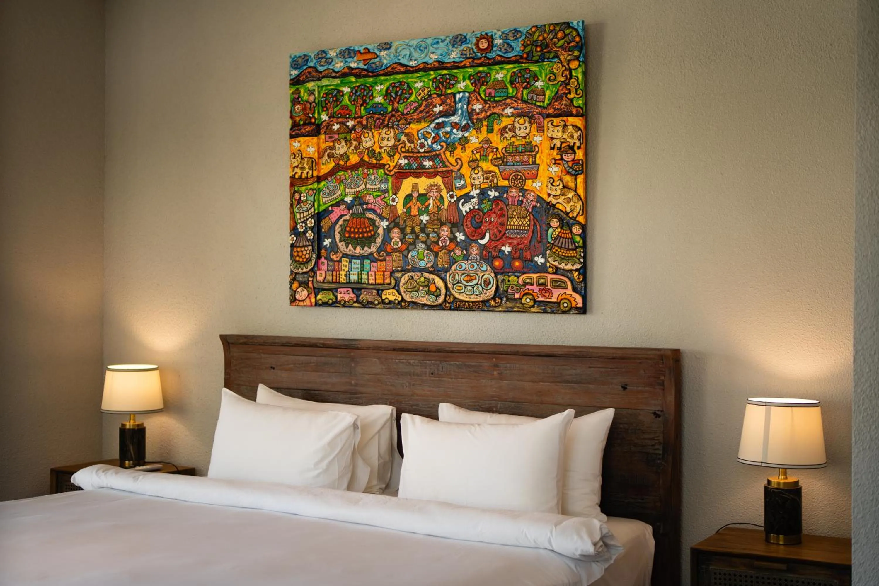 Bed in Seaside Oceana Suites by Mahaprana