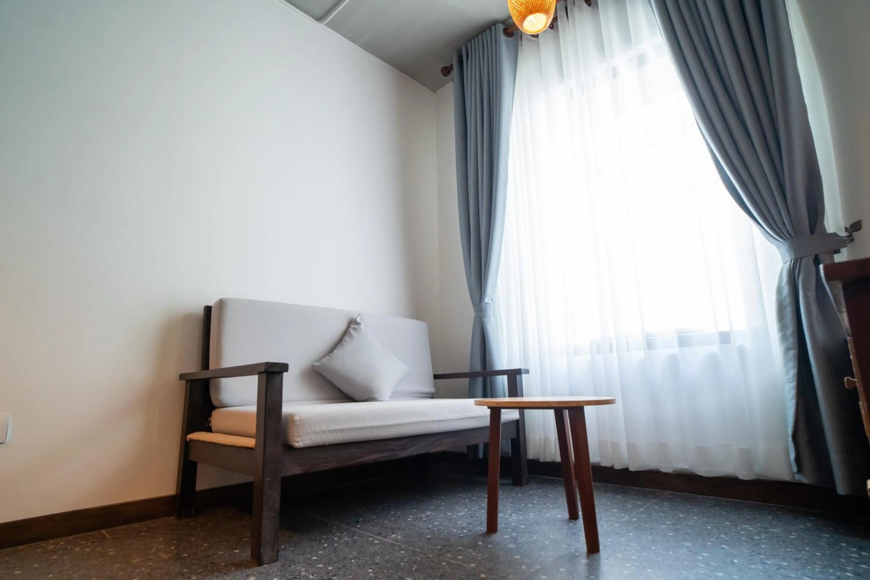 Seating area, Bed in Apartment Green Amazon