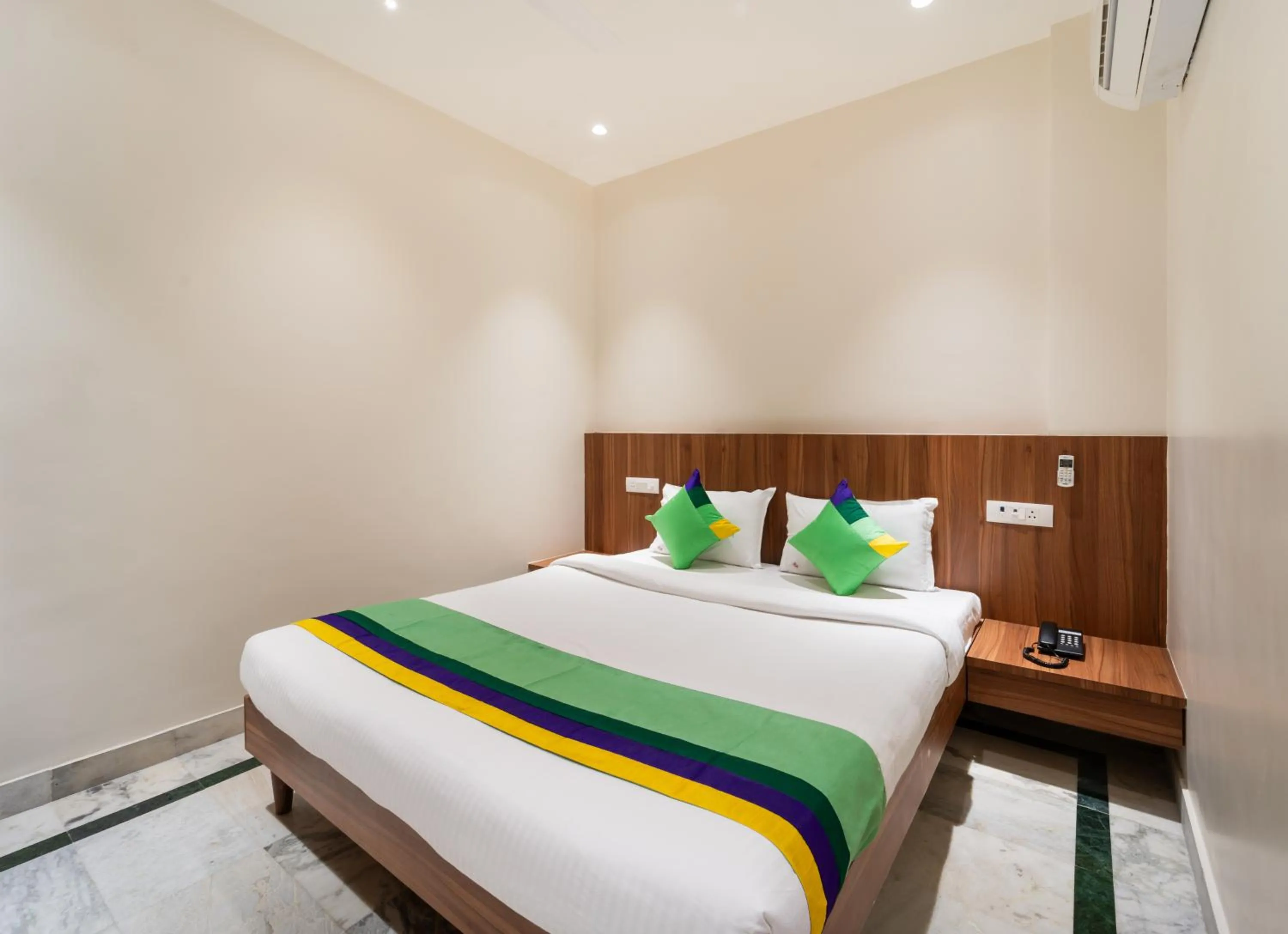 Bed in Treebo Kaveri