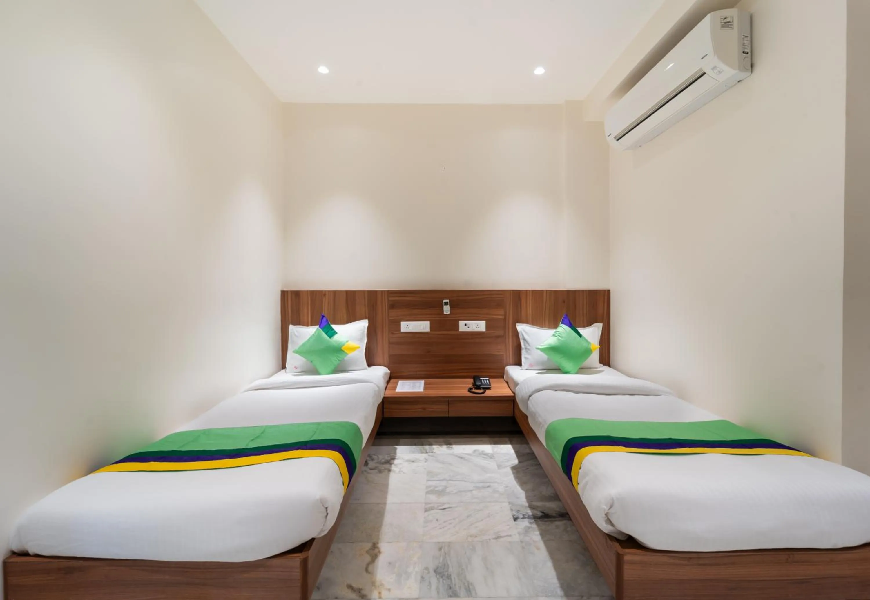 Bed in Treebo Kaveri