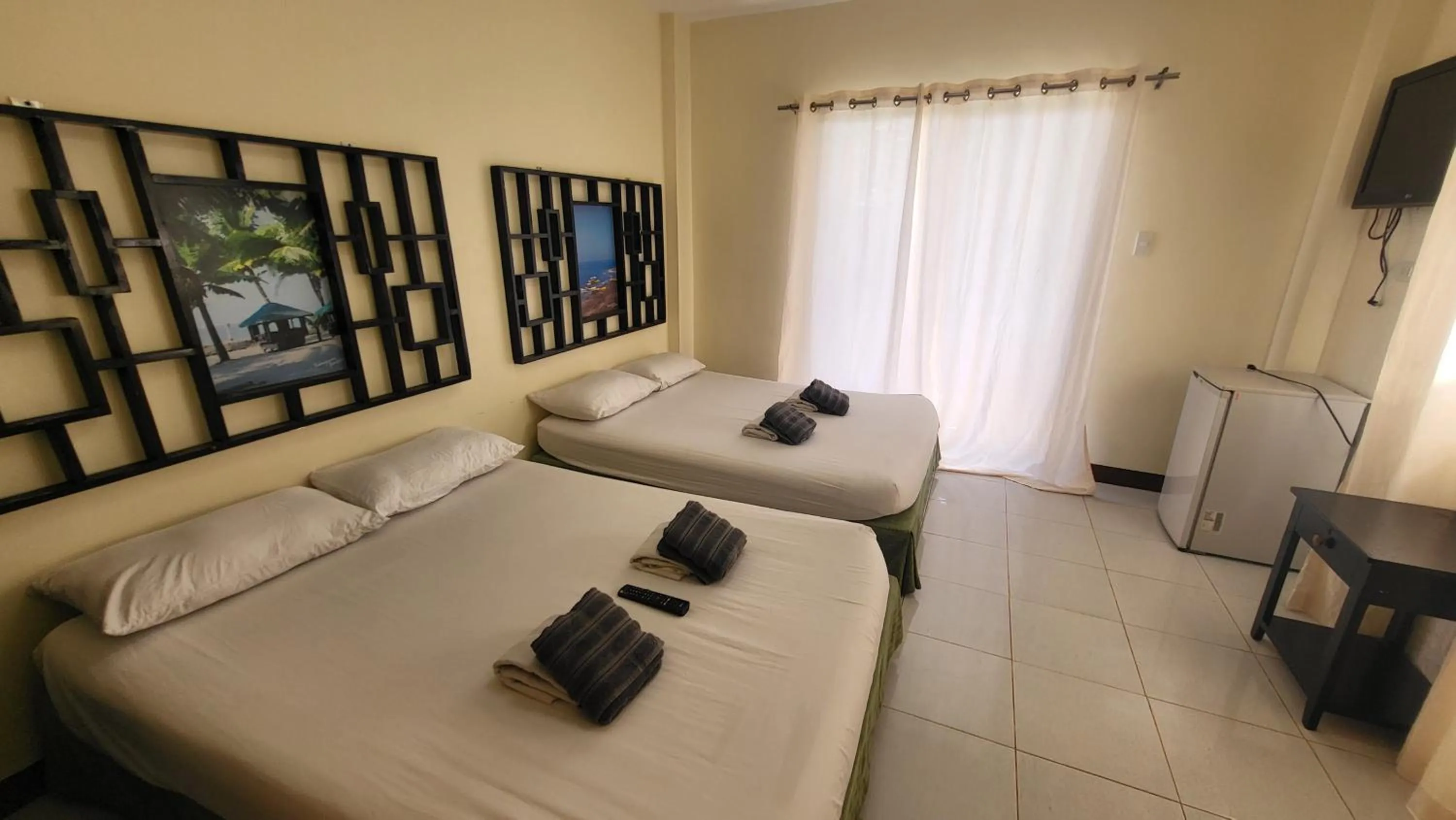 Photo of the whole room, Bed in Bakasyunan Resort and Conference Center - Tanay