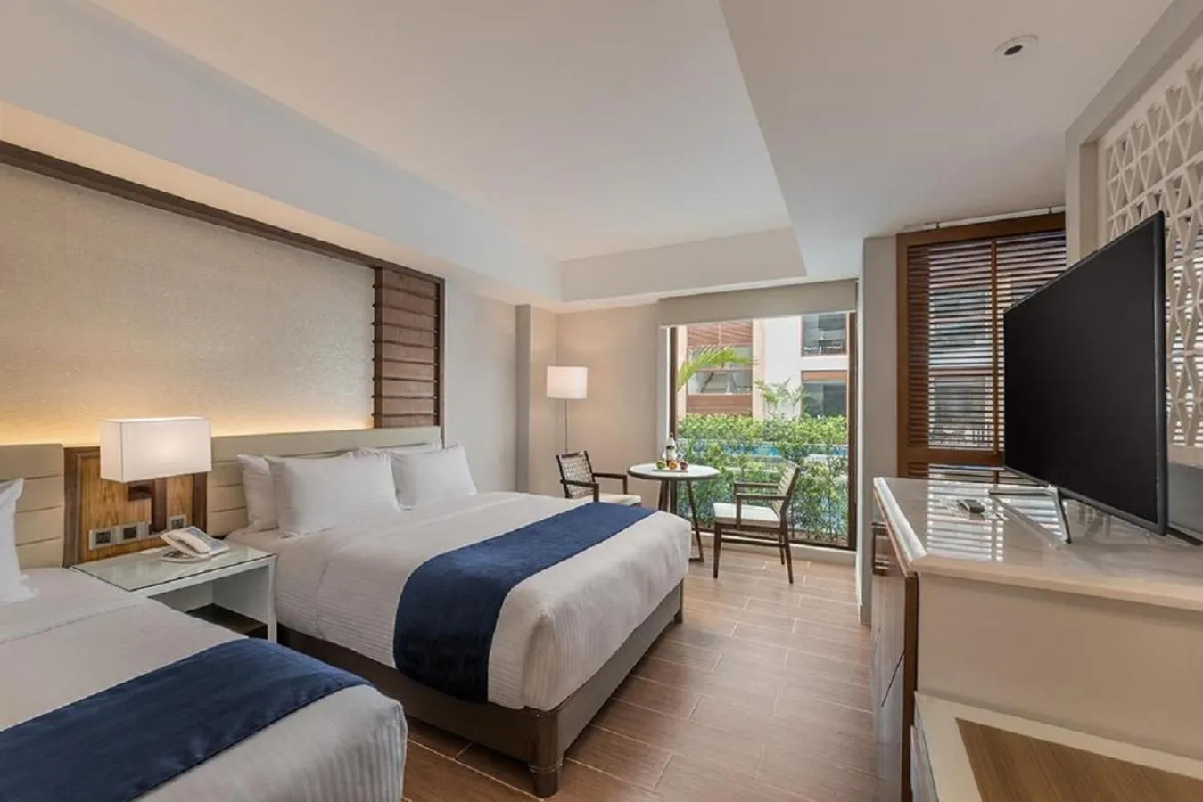 Bed in Henann Crystal Sands Resort