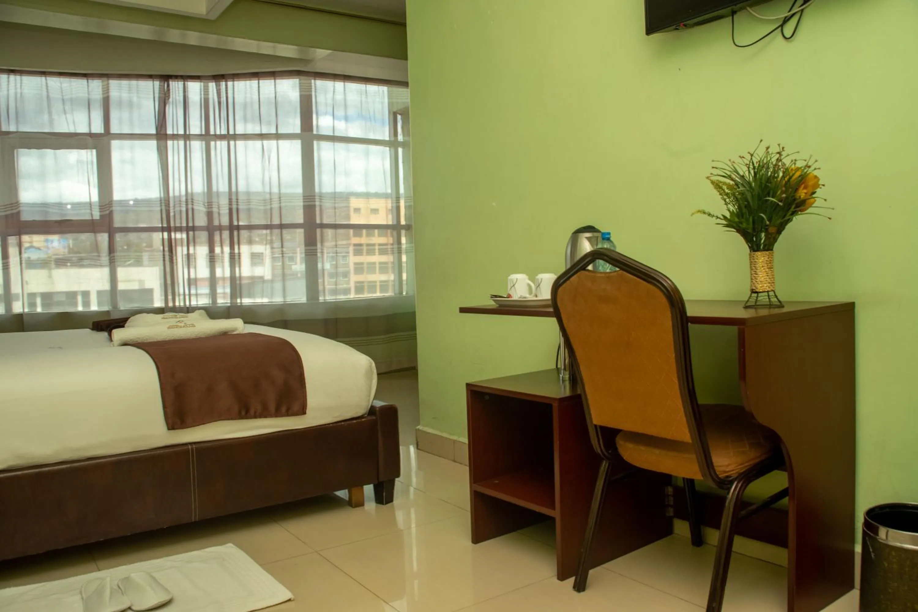 room service, Bed in Legacy Hotel and Conference Centre ltd