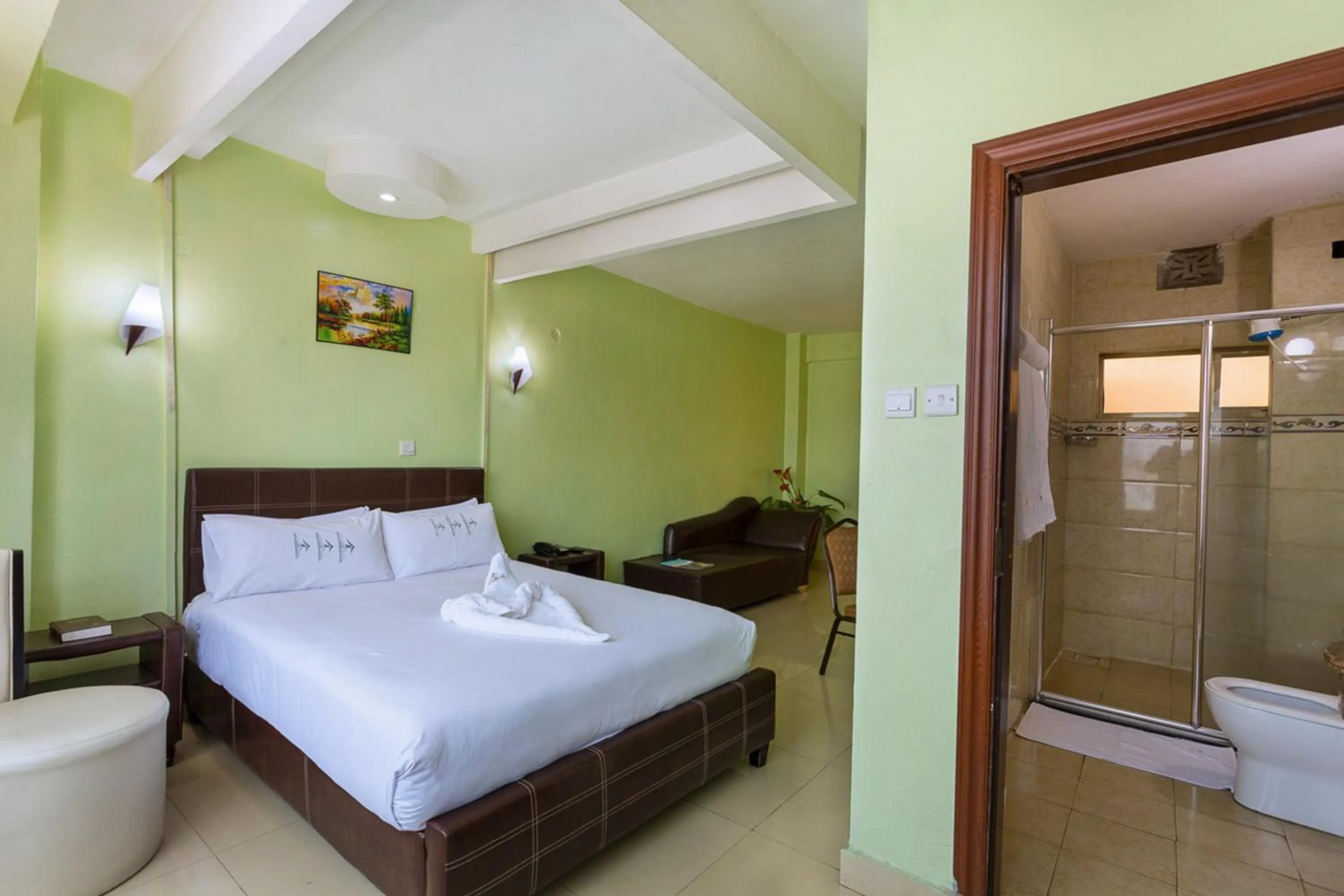 Bed in Legacy Hotel and Conference Centre ltd