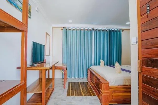 Bed in Neakru Guesthouse and Restaurant