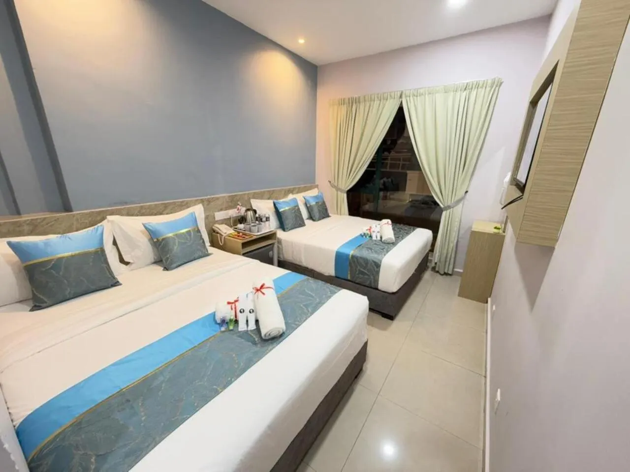 Photo of the whole room, Bed in AQ Hotel