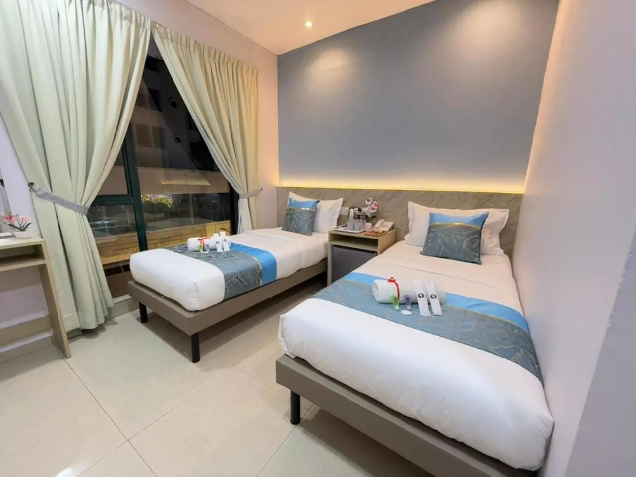 Photo of the whole room, Bed in AQ Hotel