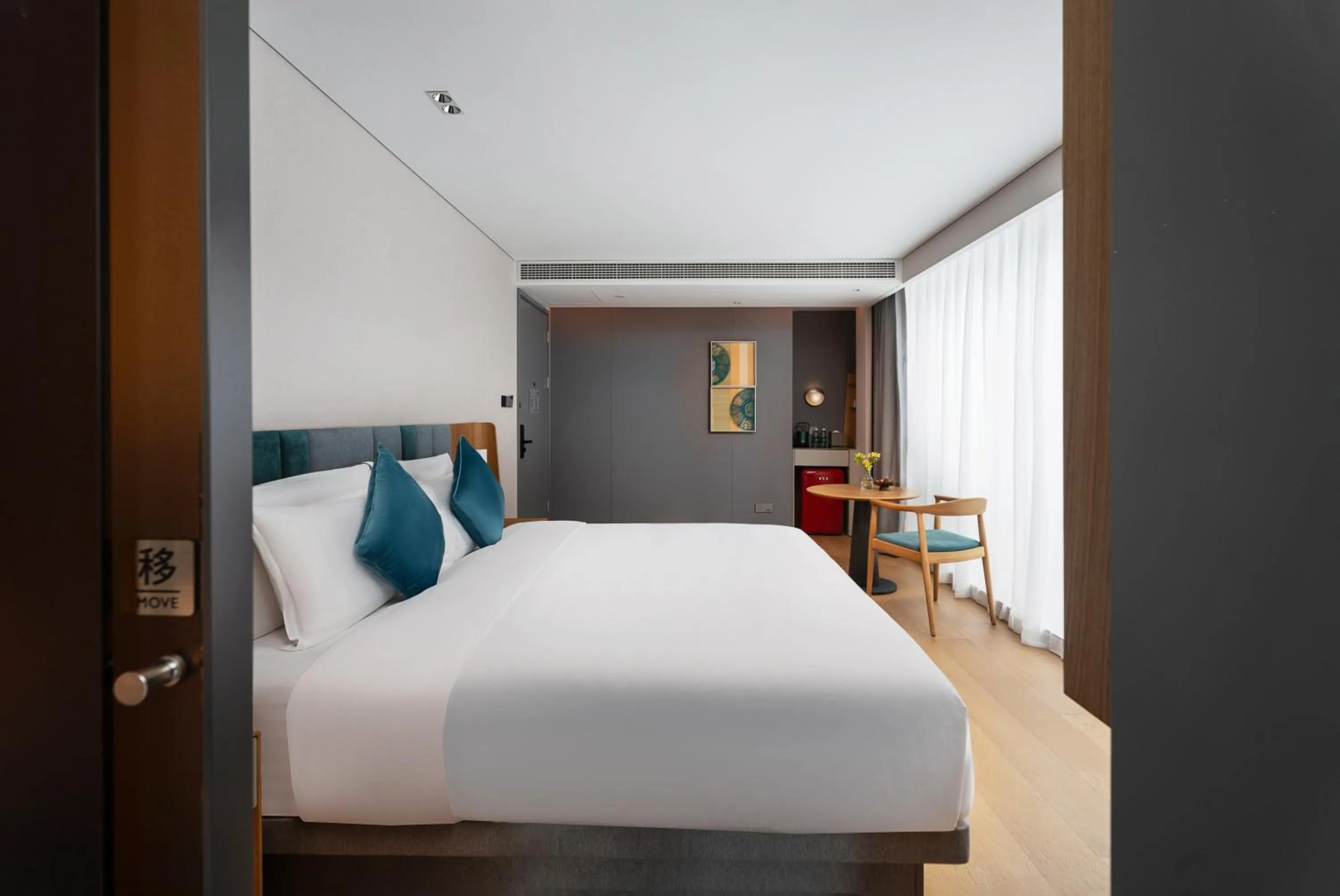 Bed in Pagoda Hotel Of SSAW ChongQing International Land-sea