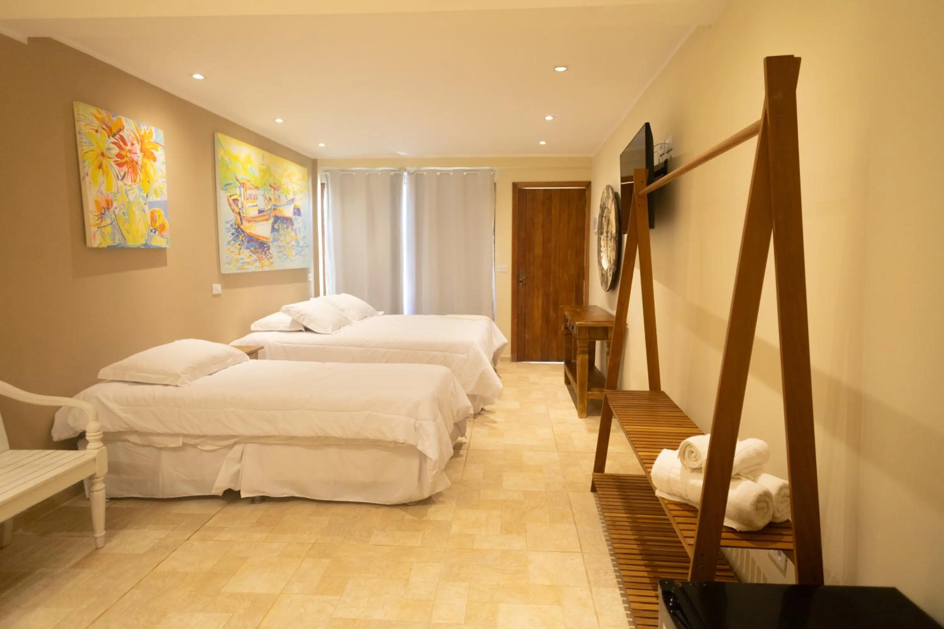 Bed in Pousada La Dolce Vita