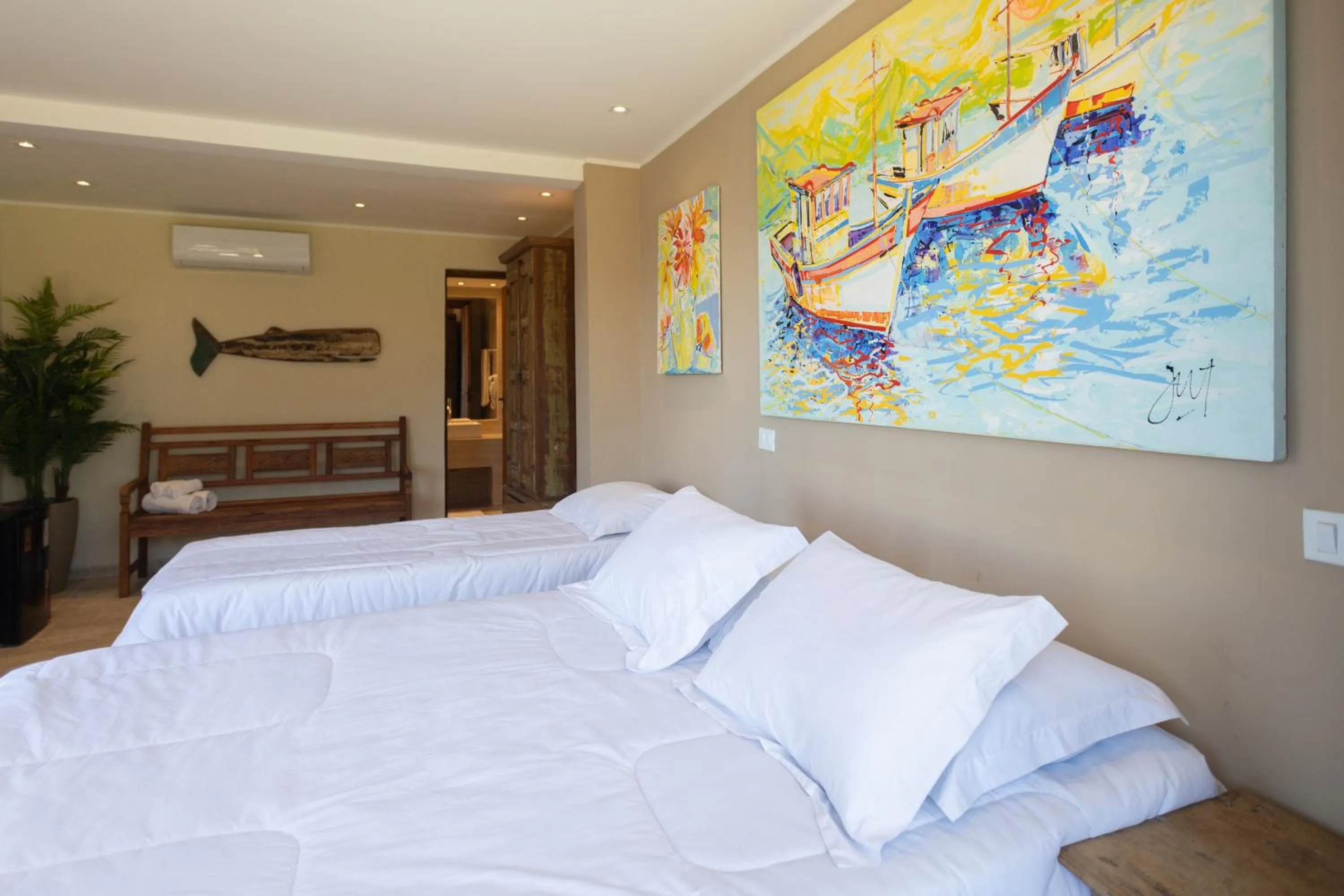 Bed in Pousada La Dolce Vita