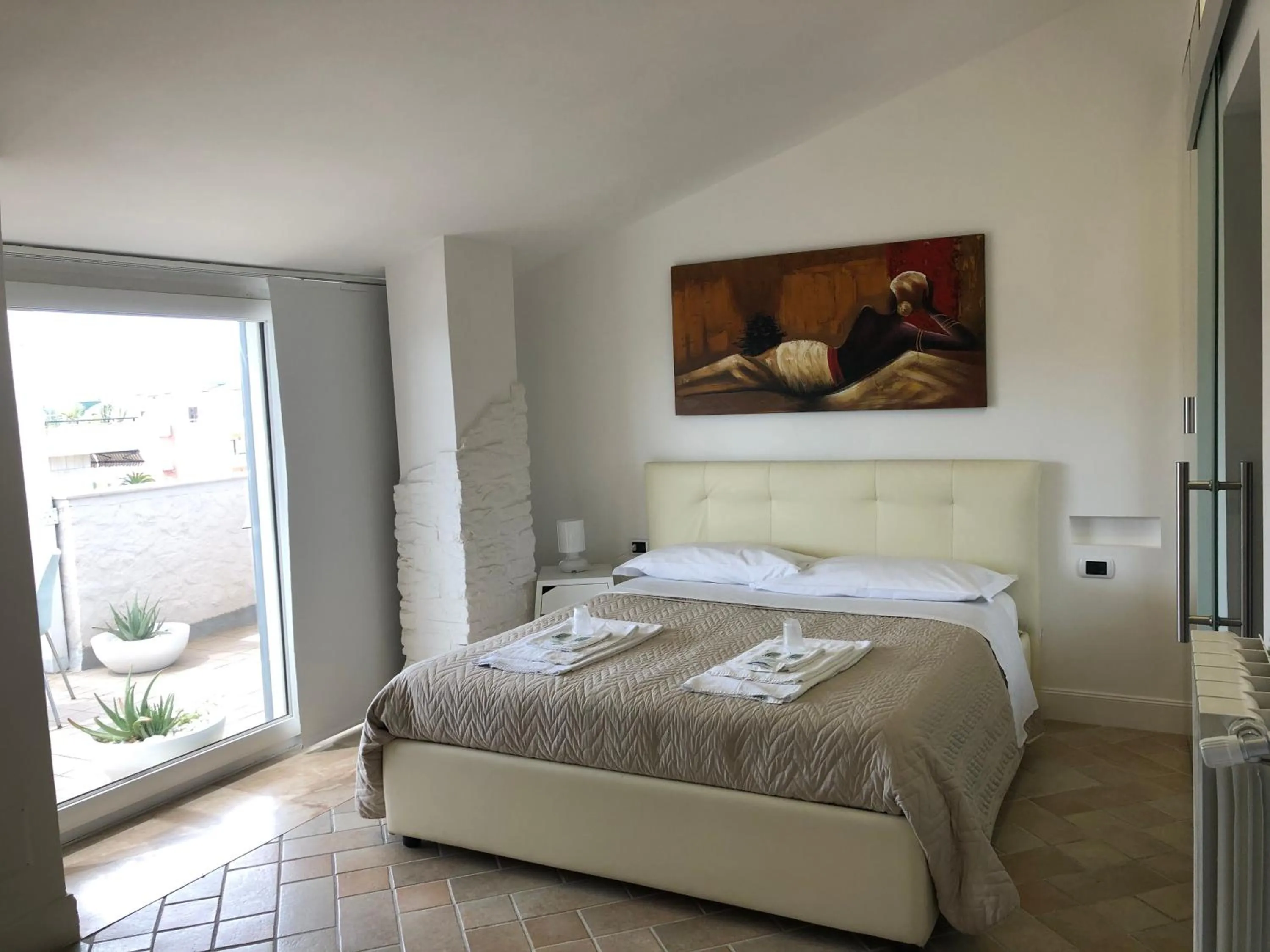 Bed in Attico Luxury B&B