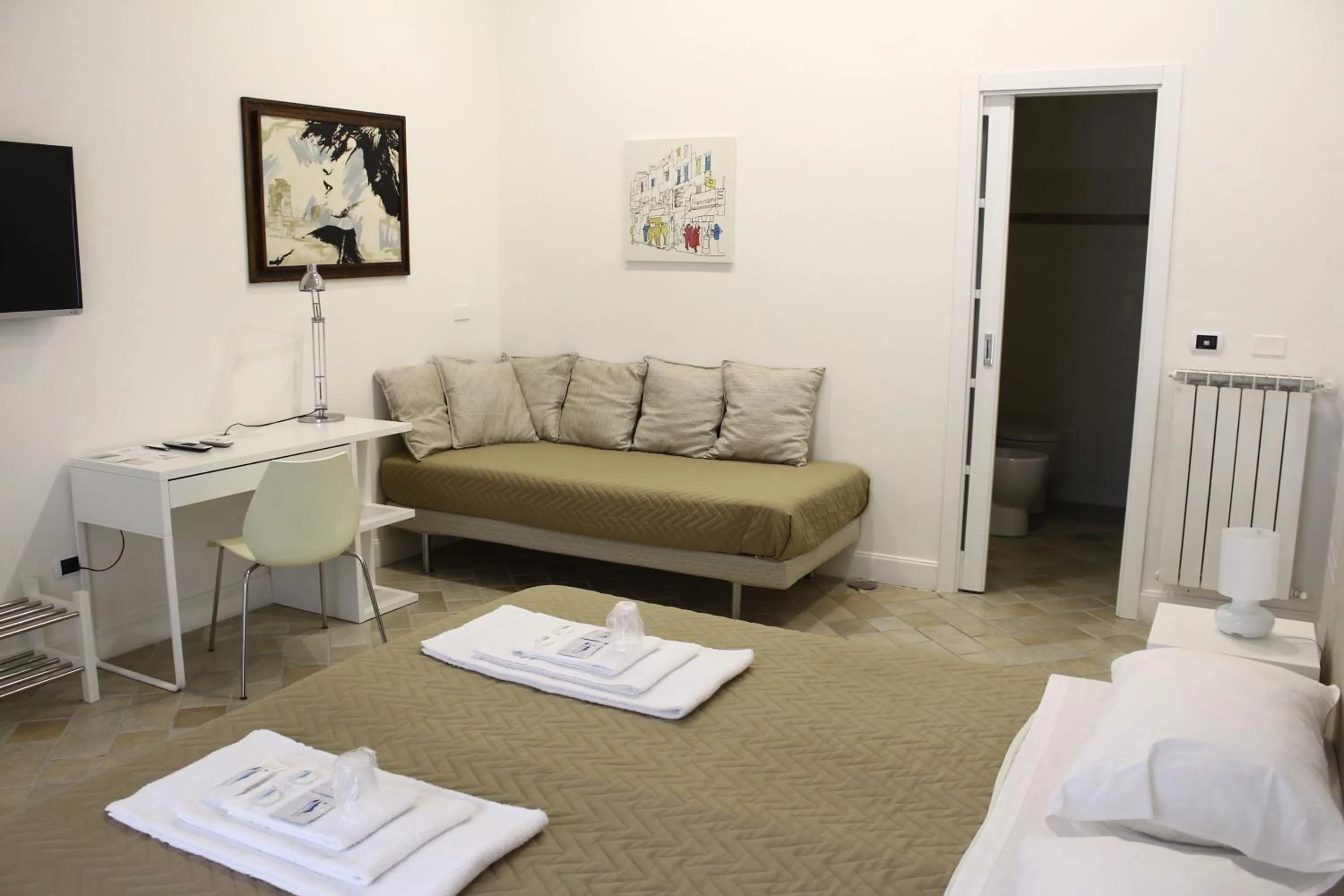 Photo of the whole room in Attico Luxury B&B