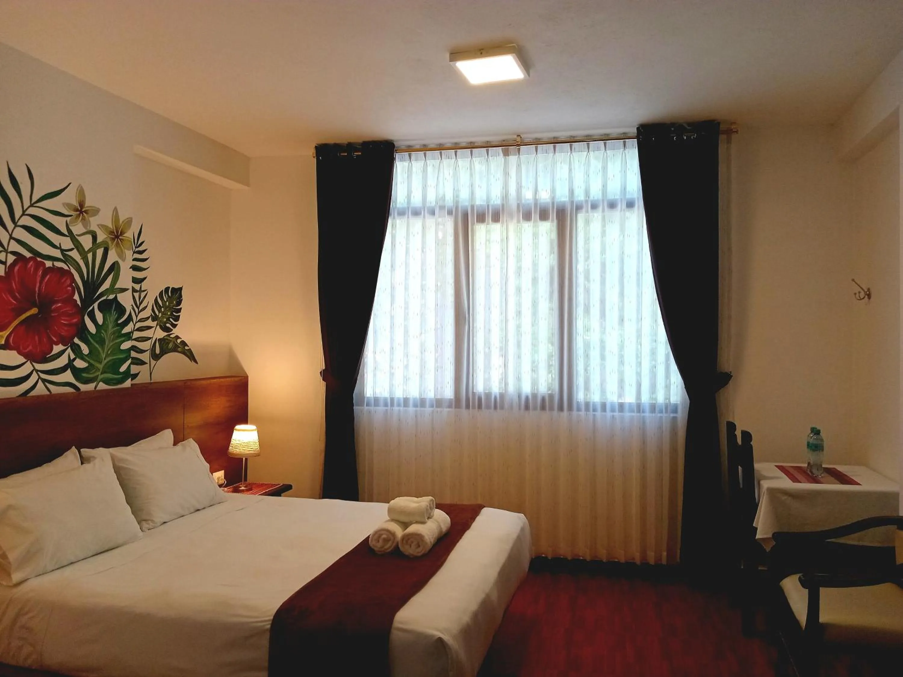 Bed in Susanna Inn MachuPicchu Hotel