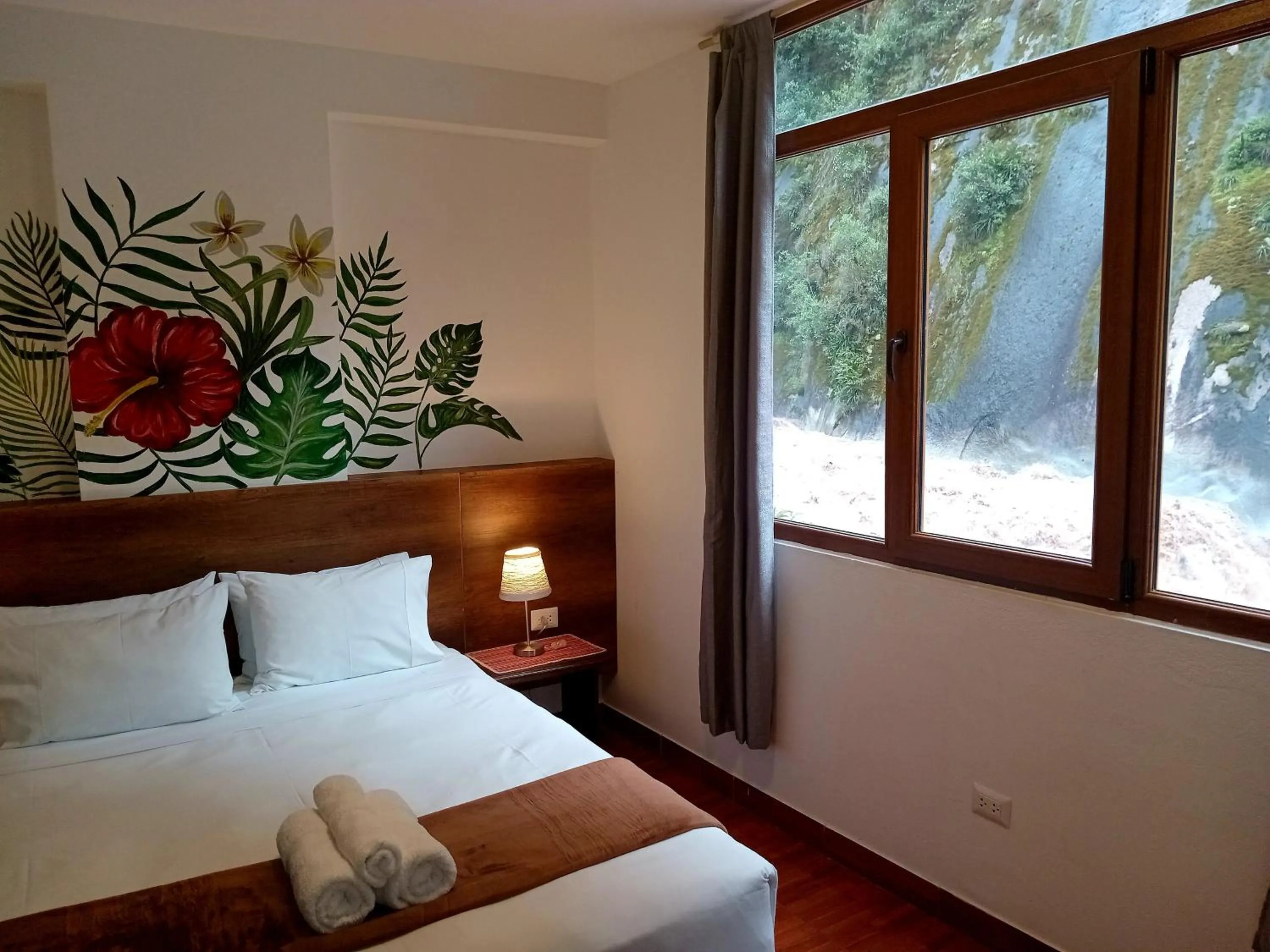 Bed in Susanna Inn MachuPicchu Hotel