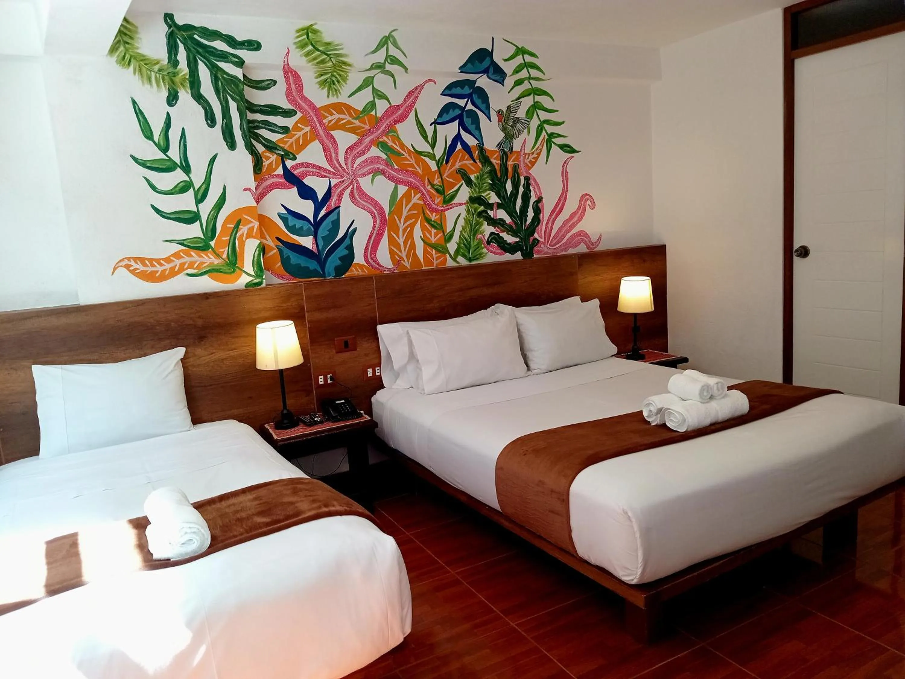 Bed in Susanna Inn MachuPicchu Hotel