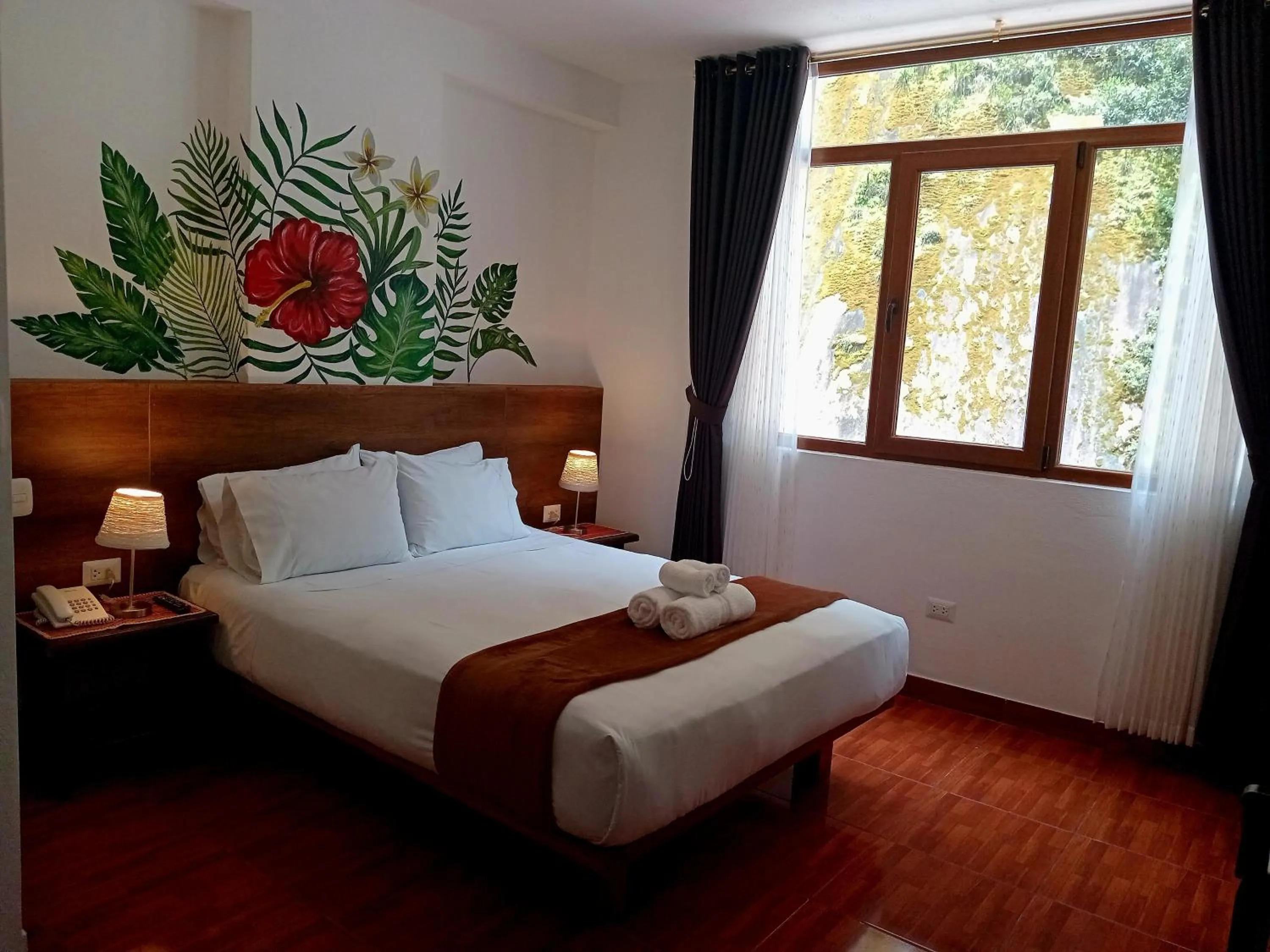 Bed in Susanna Inn MachuPicchu Hotel