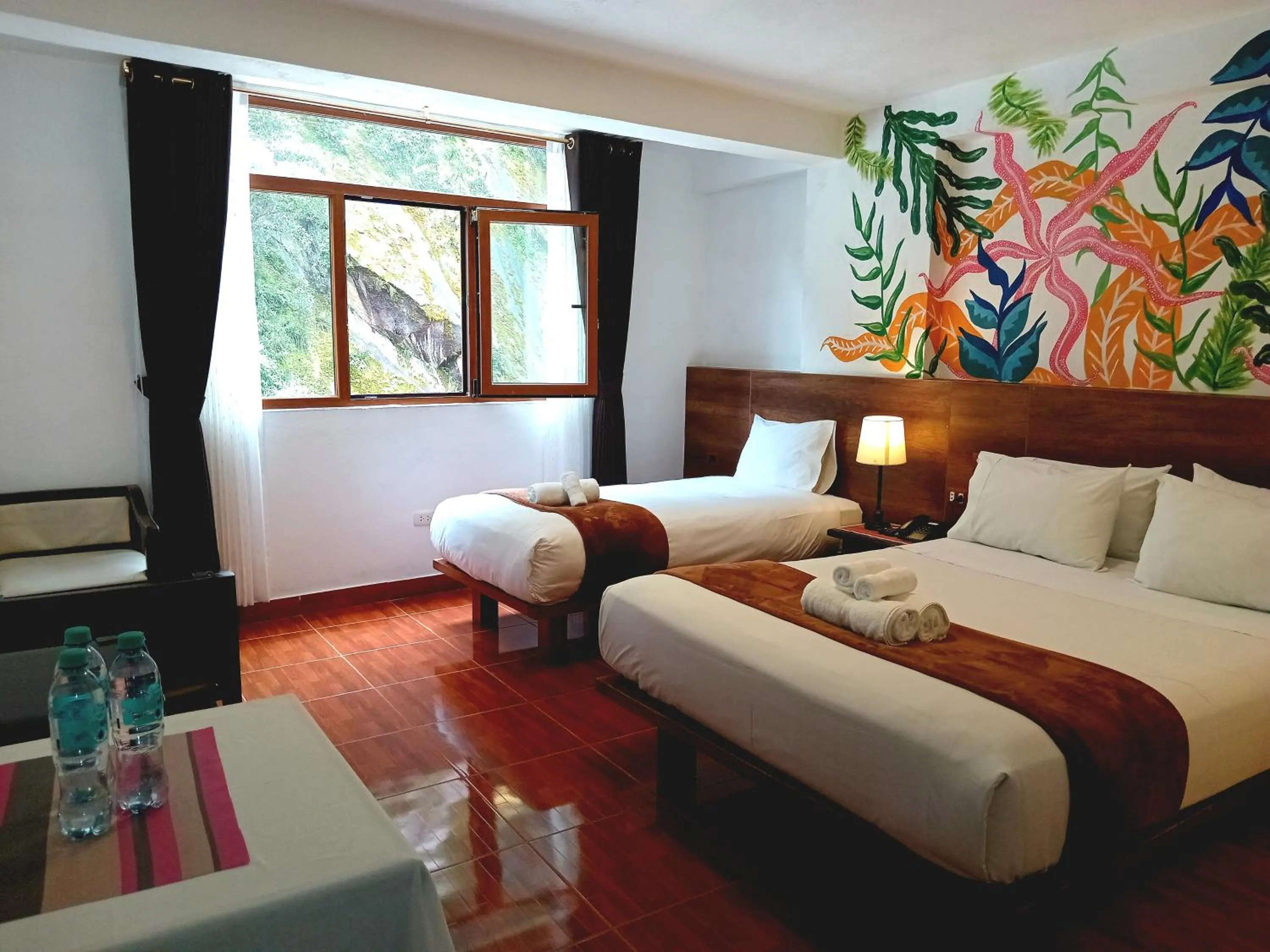 Bed in Susanna Inn MachuPicchu Hotel