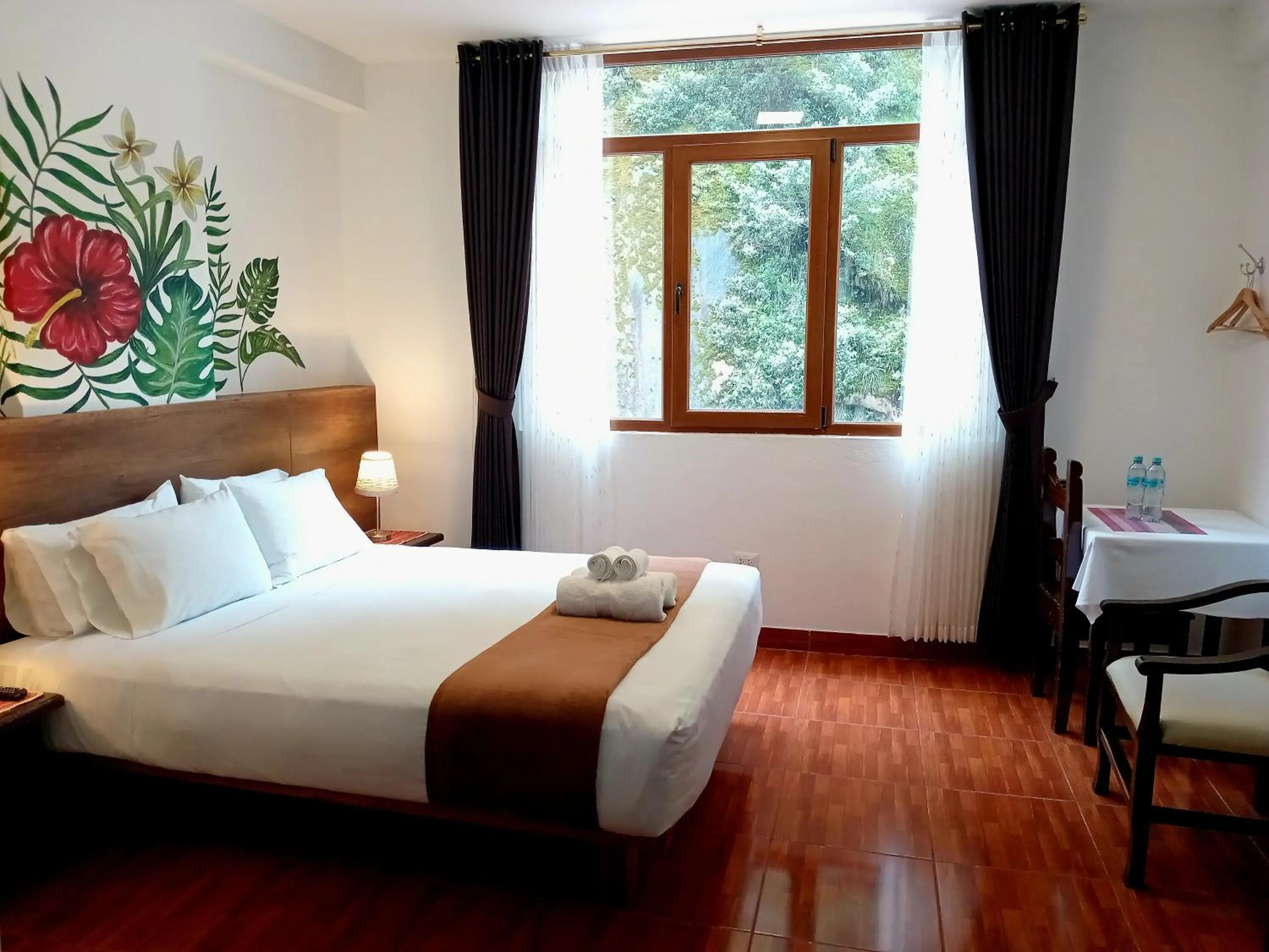 Bed in Susanna Inn MachuPicchu Hotel