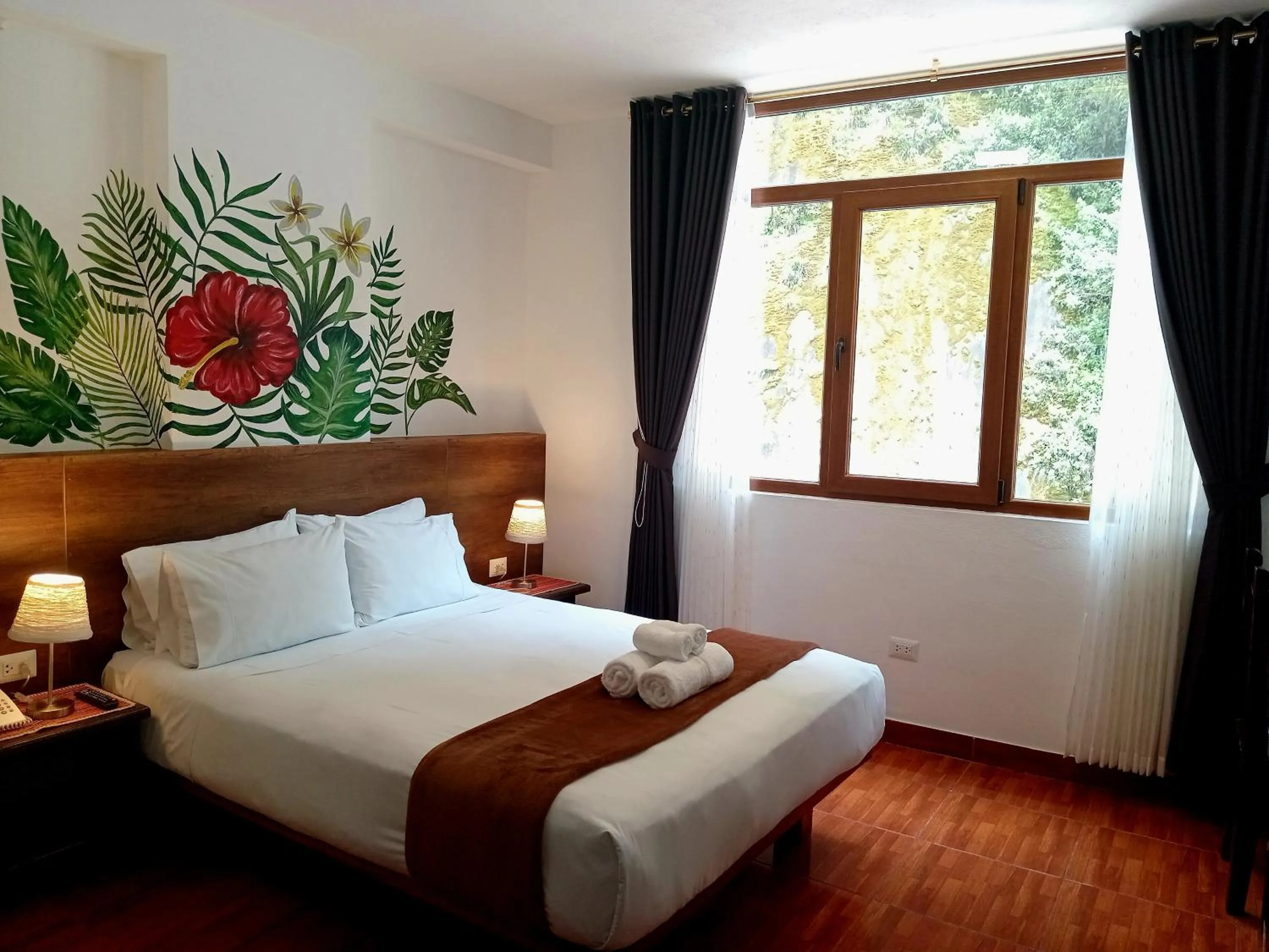 Bed in Susanna Inn MachuPicchu Hotel