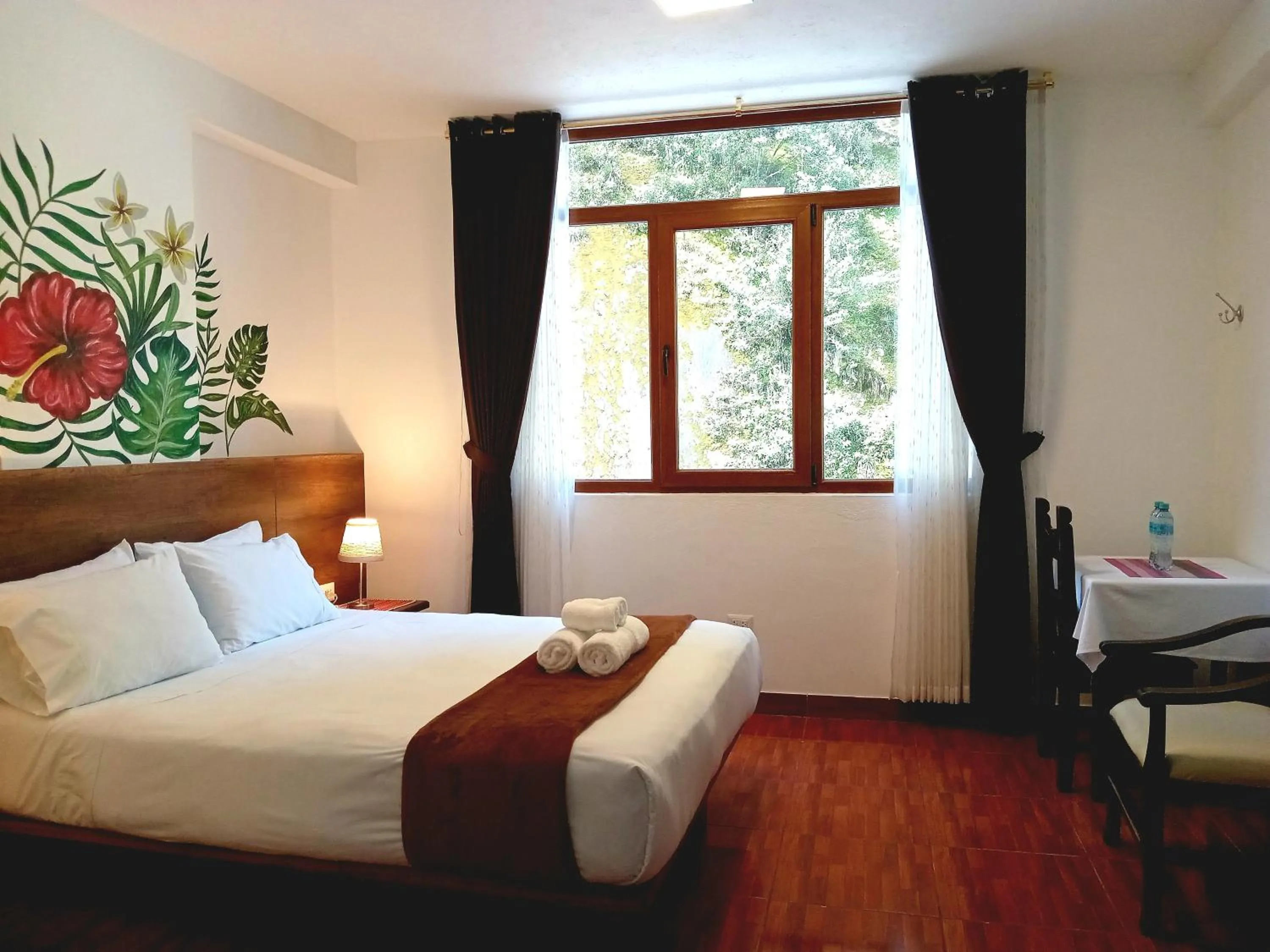 Bed in Susanna Inn MachuPicchu Hotel