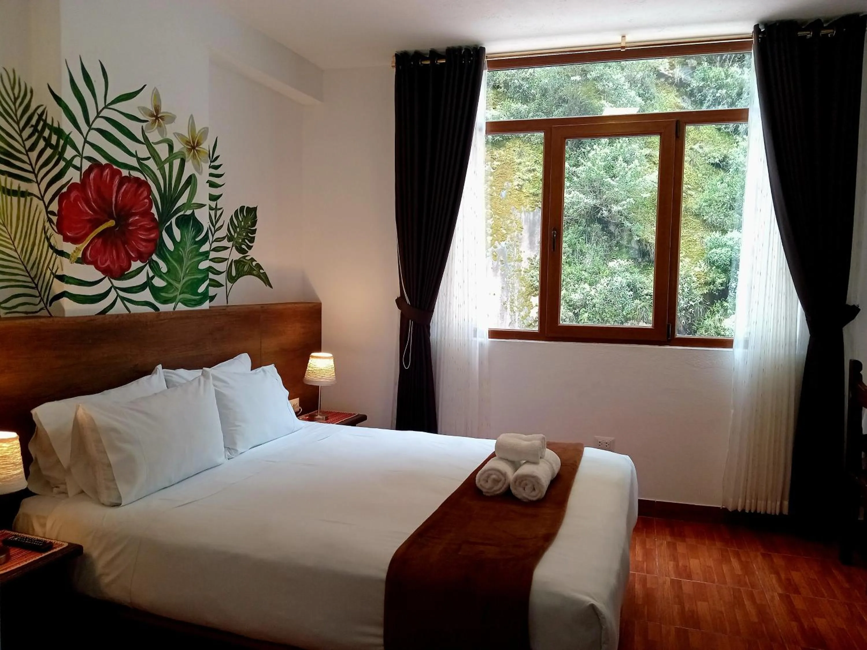 Bed in Susanna Inn MachuPicchu Hotel