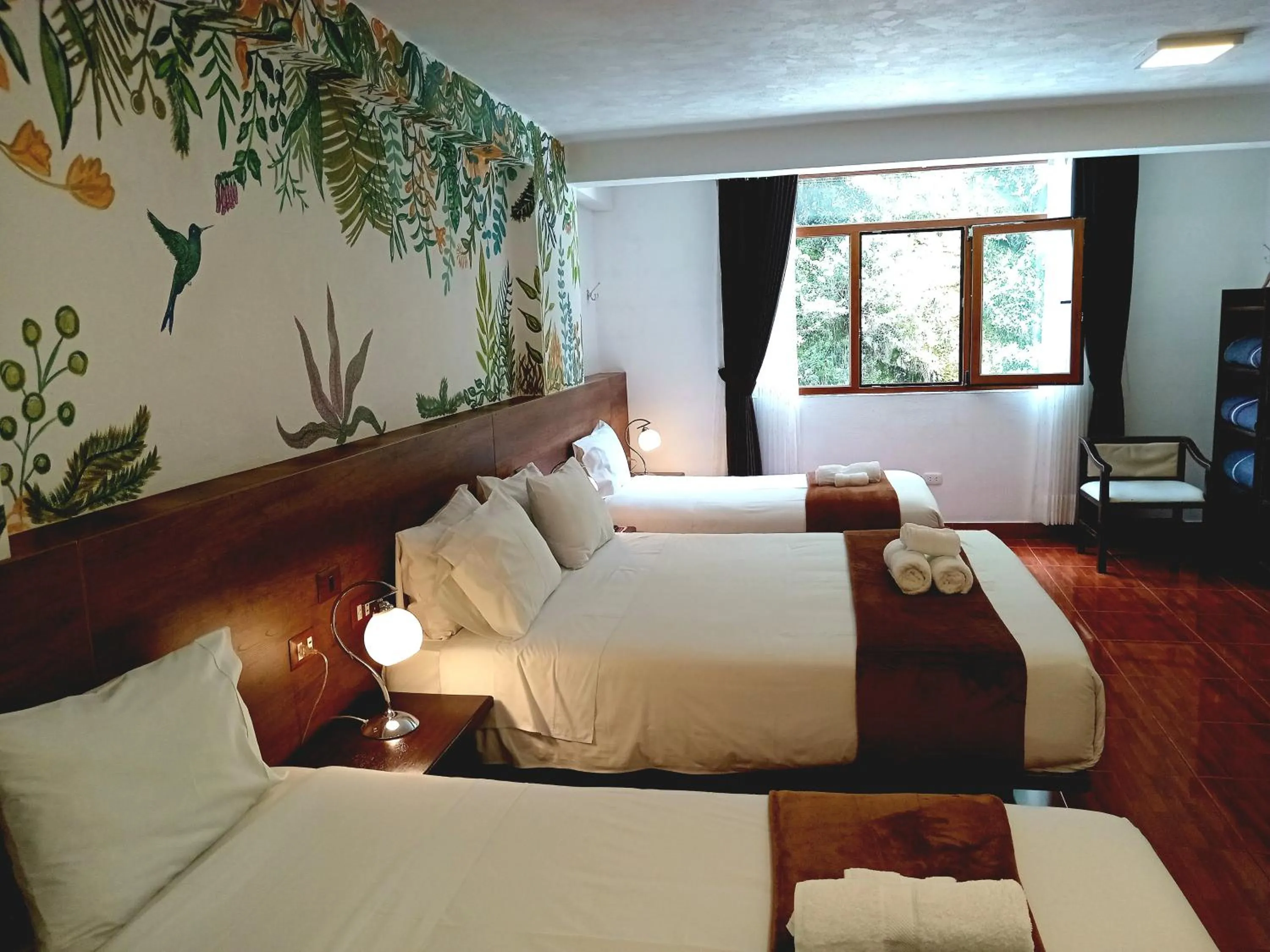 Bed in Susanna Inn MachuPicchu Hotel