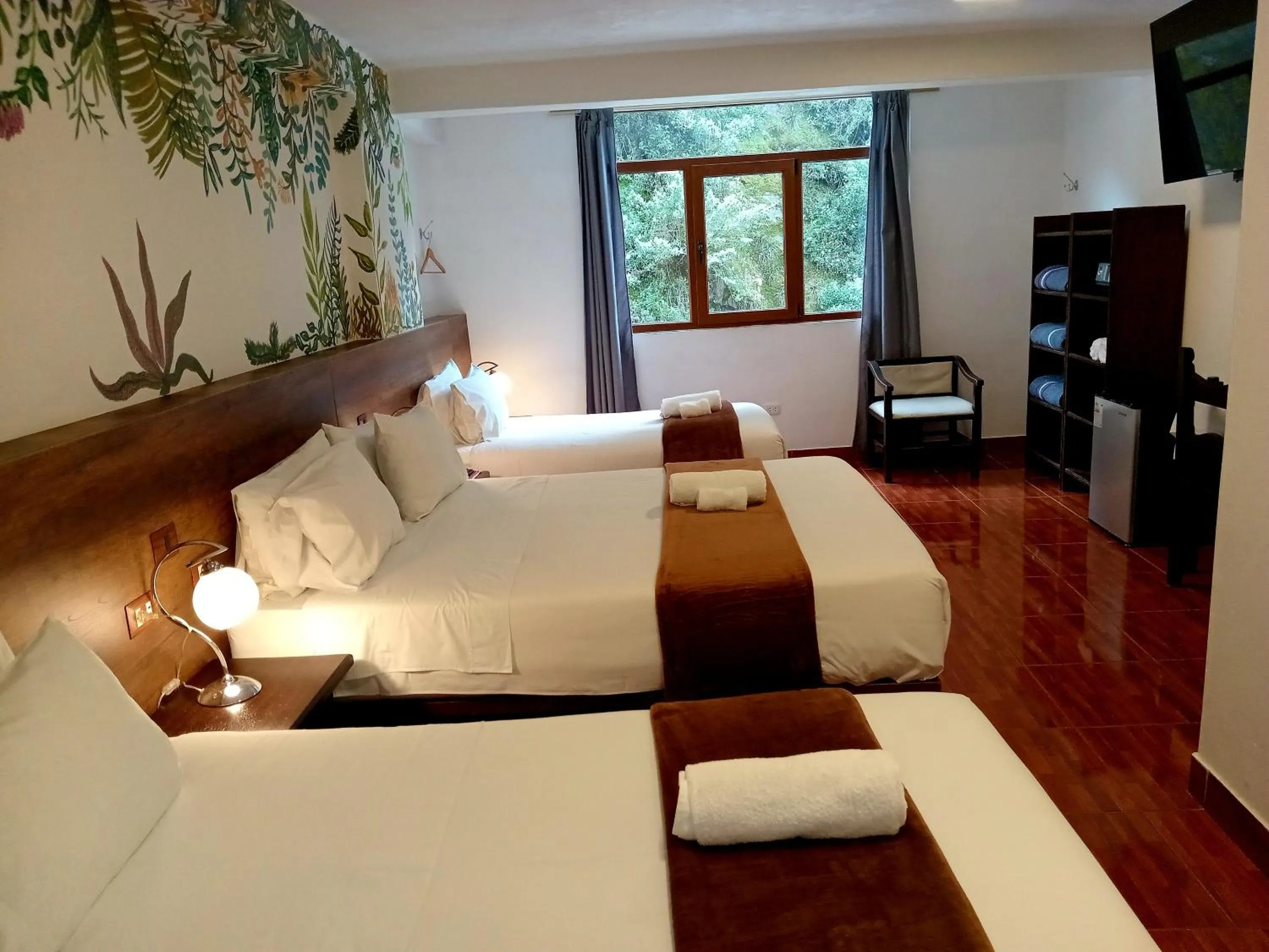 Photo of the whole room, Bed in Susanna Inn MachuPicchu Hotel