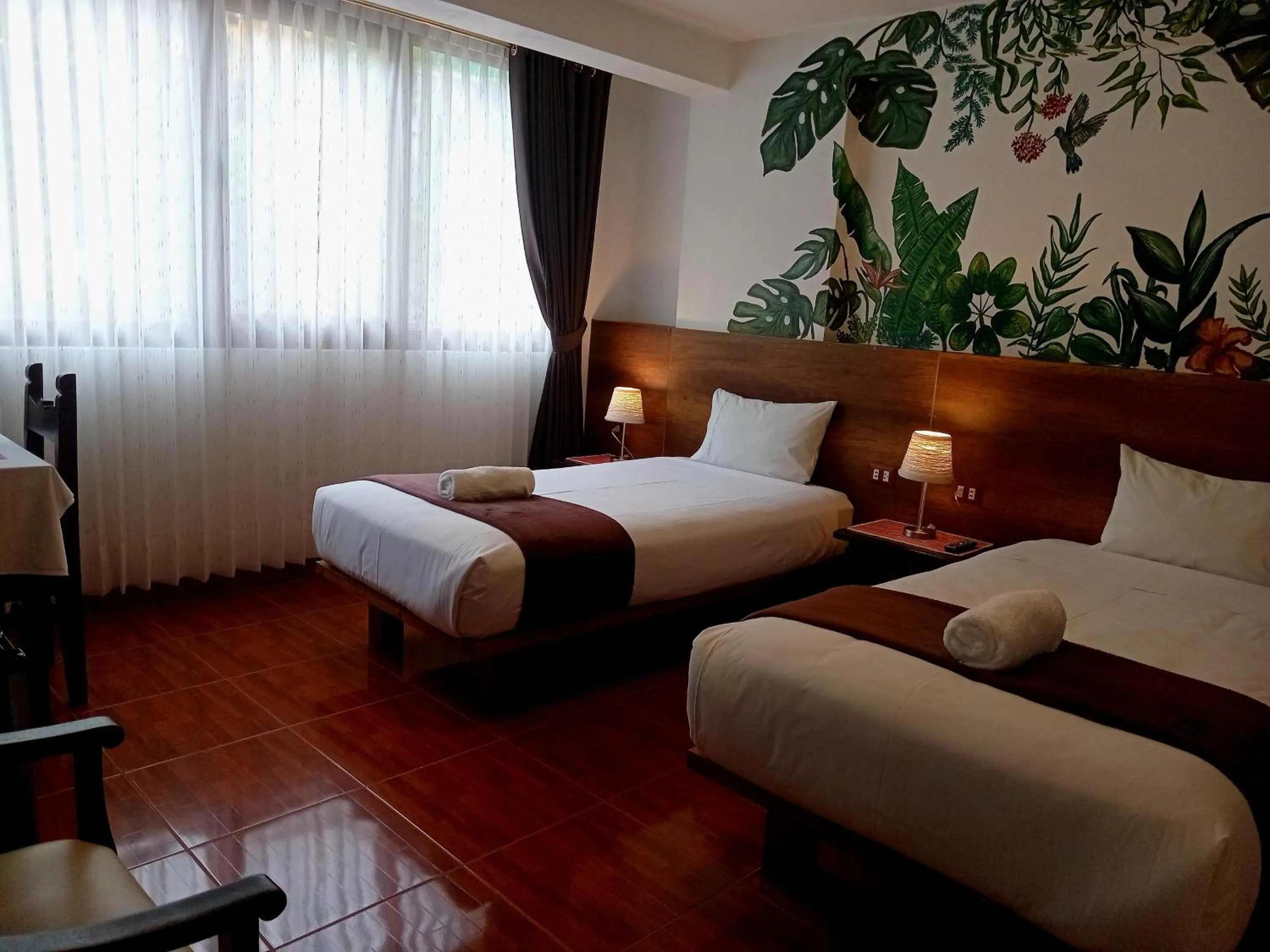 Bed in Susanna Inn MachuPicchu Hotel