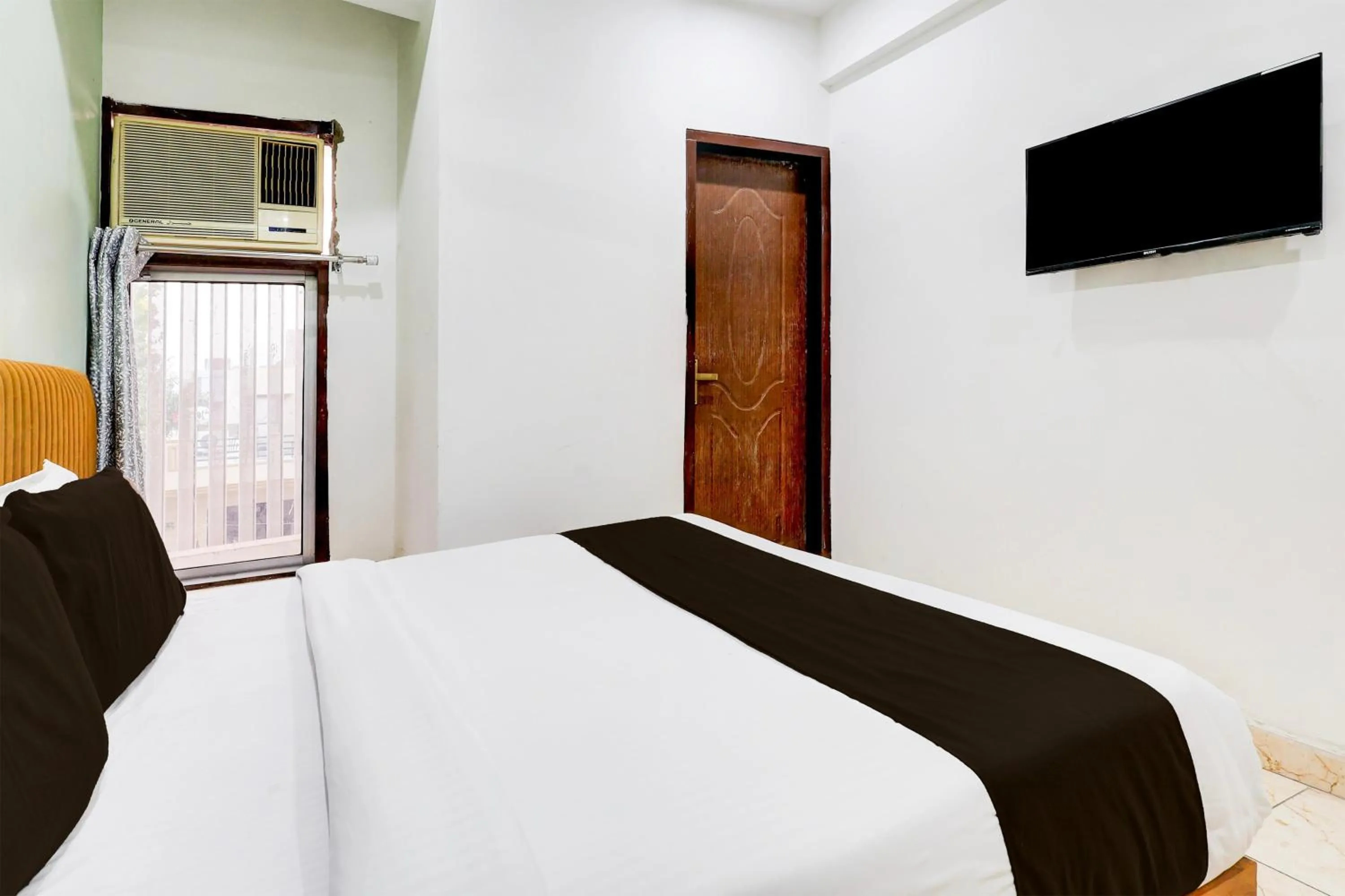 Bedroom, Bed in Super Hotel O Ambedkar Chowk Rewari formerly Hotel Shree