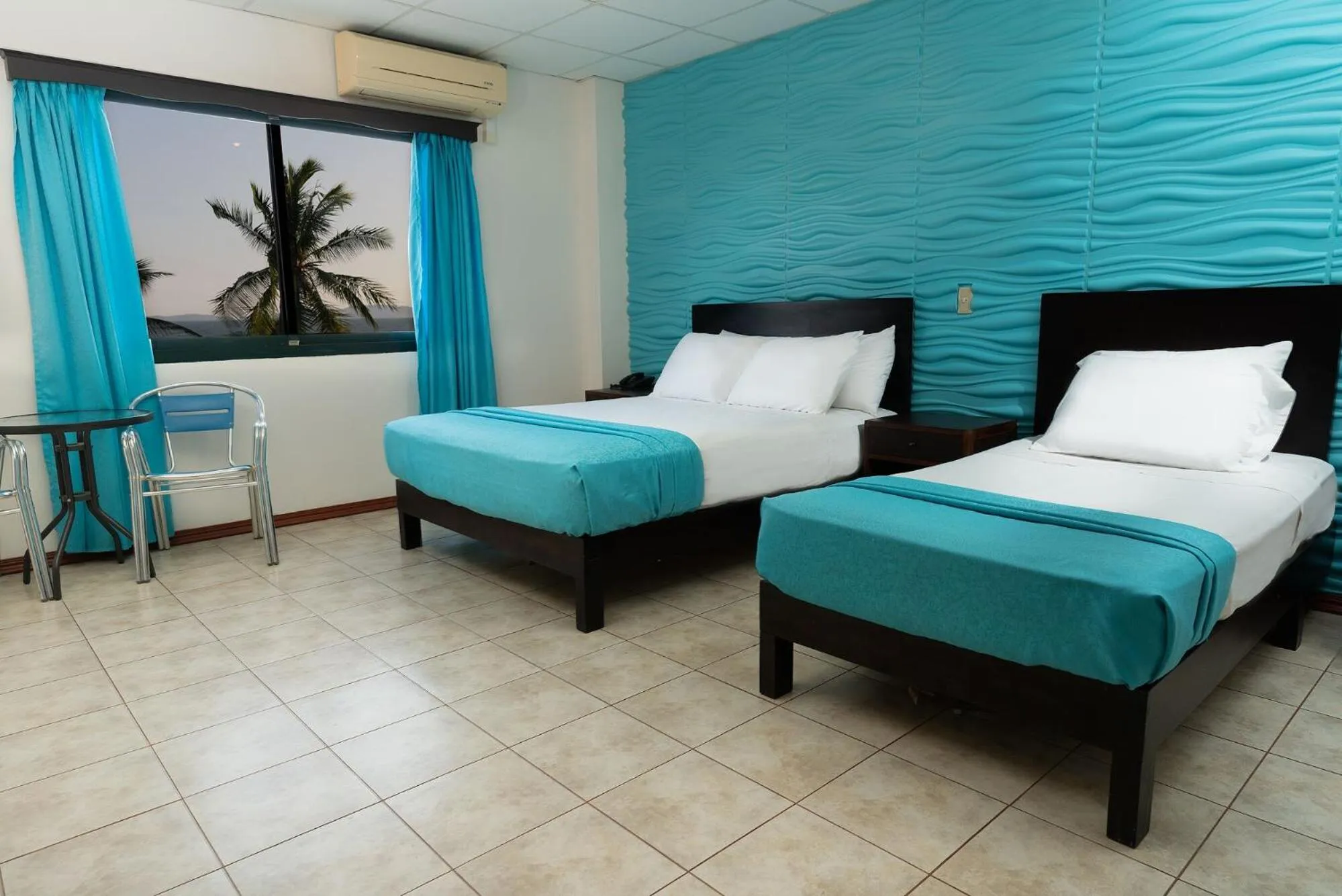 Bed in Hotel Puntarenas Beach