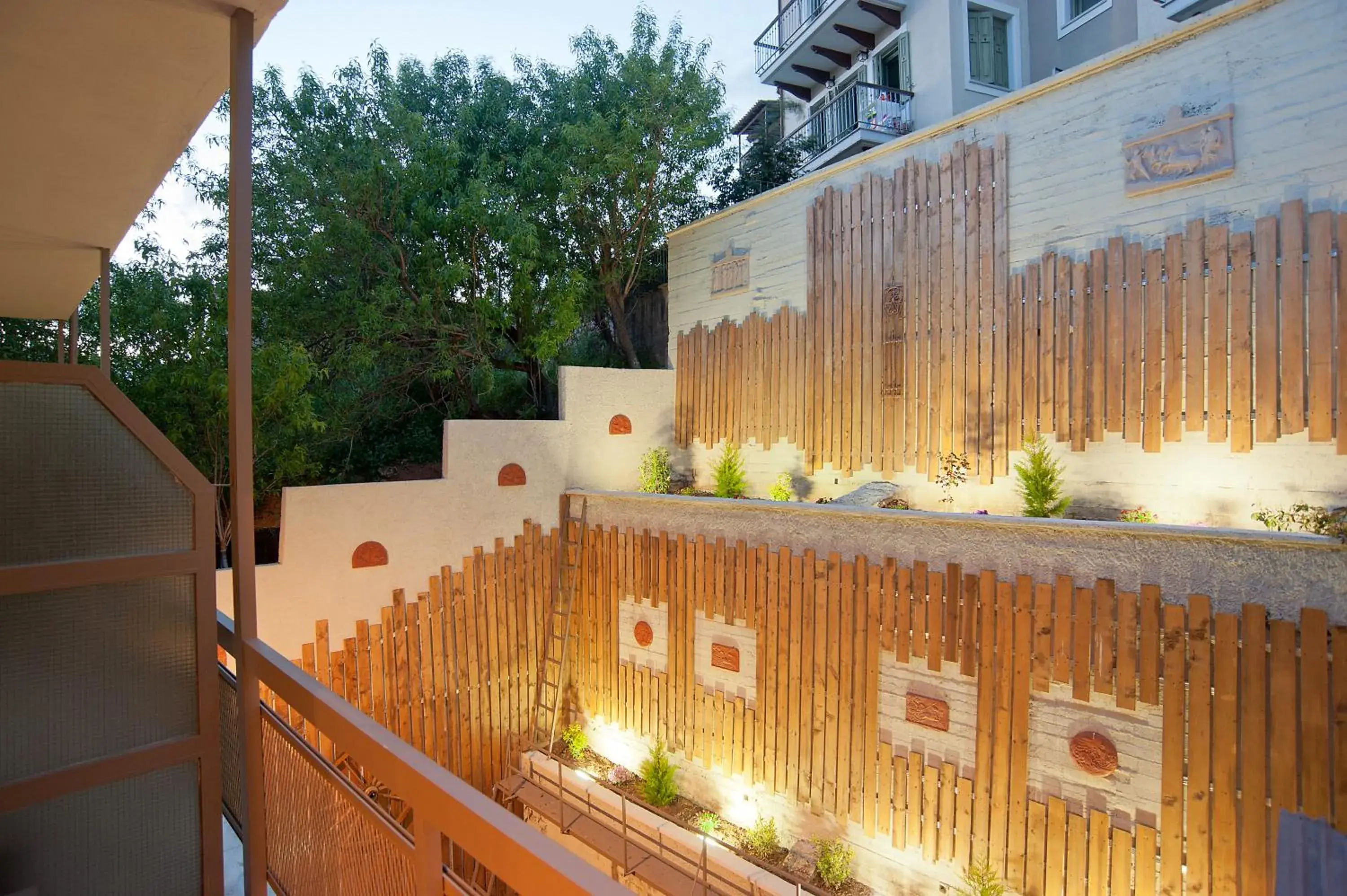 Triple Room with Balcony and Garden View in Nidimos Hotel Triple Room with Balcony and Garden View in Nidimos Hotel