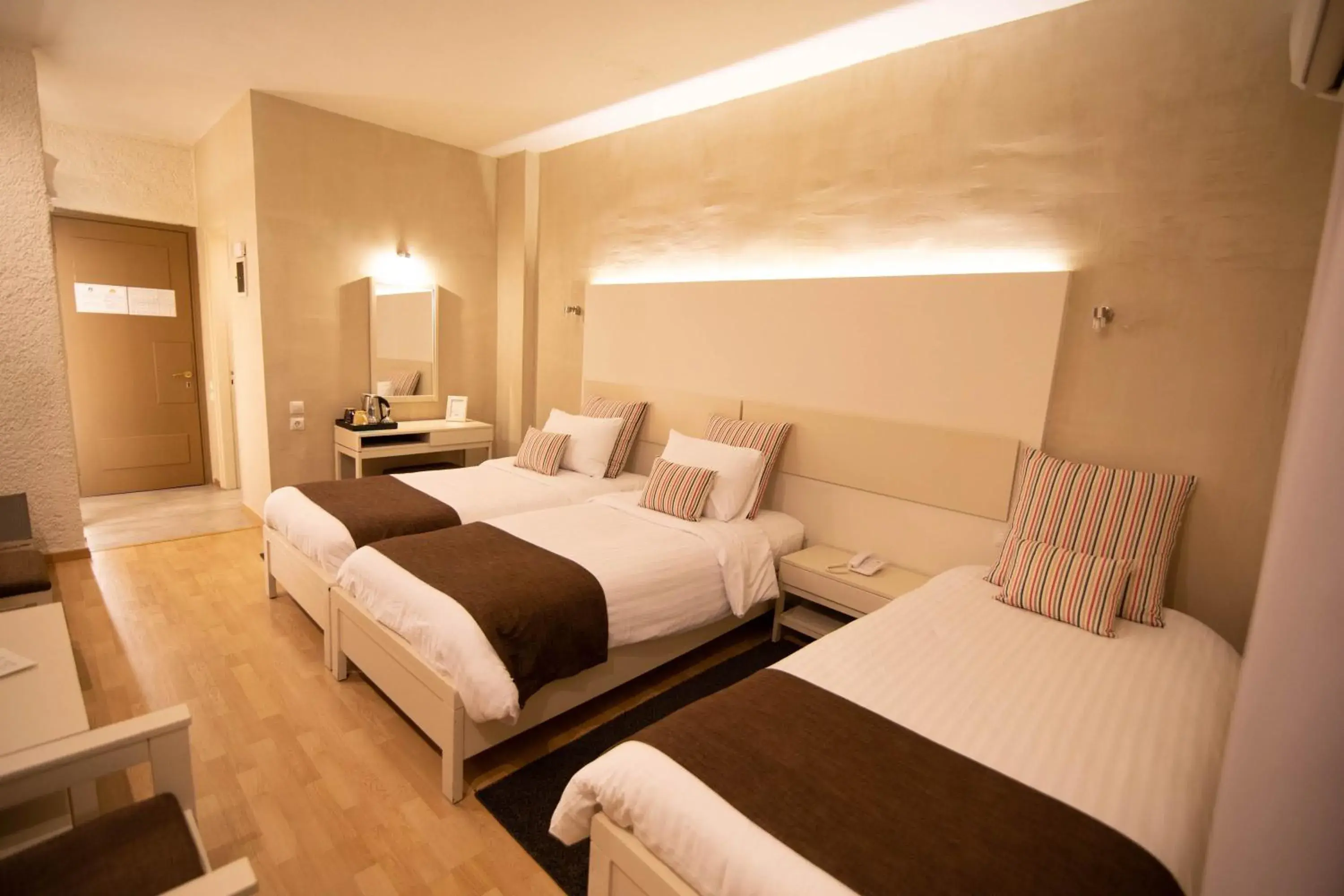 Economy Triple Room in Nidimos Hotel Economy Triple Room in Nidimos Hotel