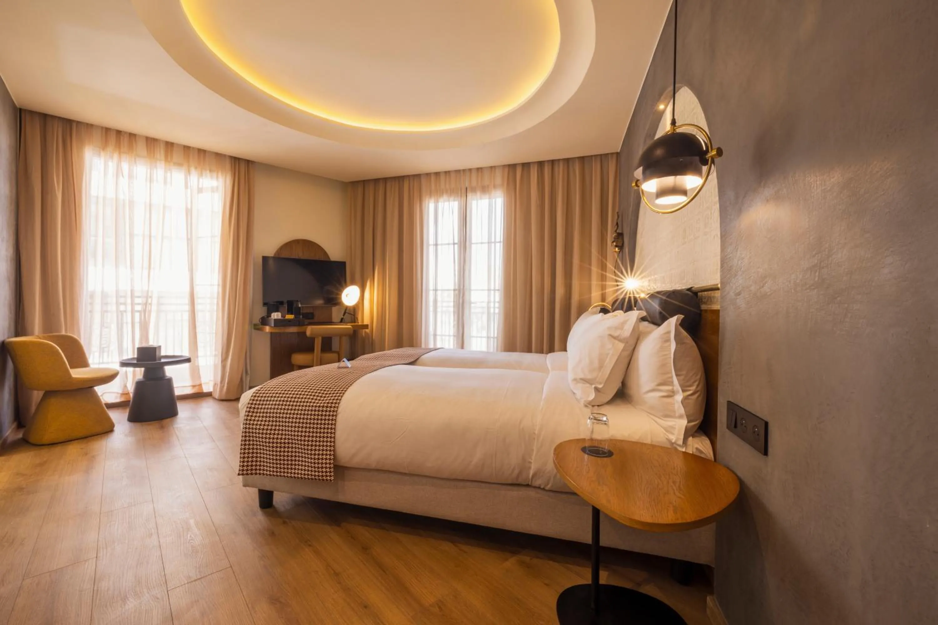 Photo of the whole room, Bed in Le Square By Onomo Collection