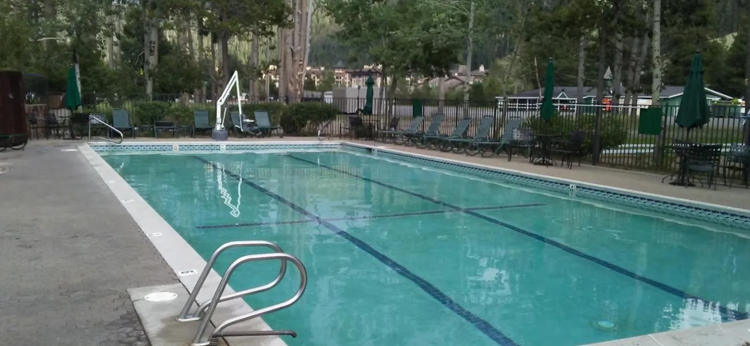 Swimming pool in GetAways at Olympic Village Inn
