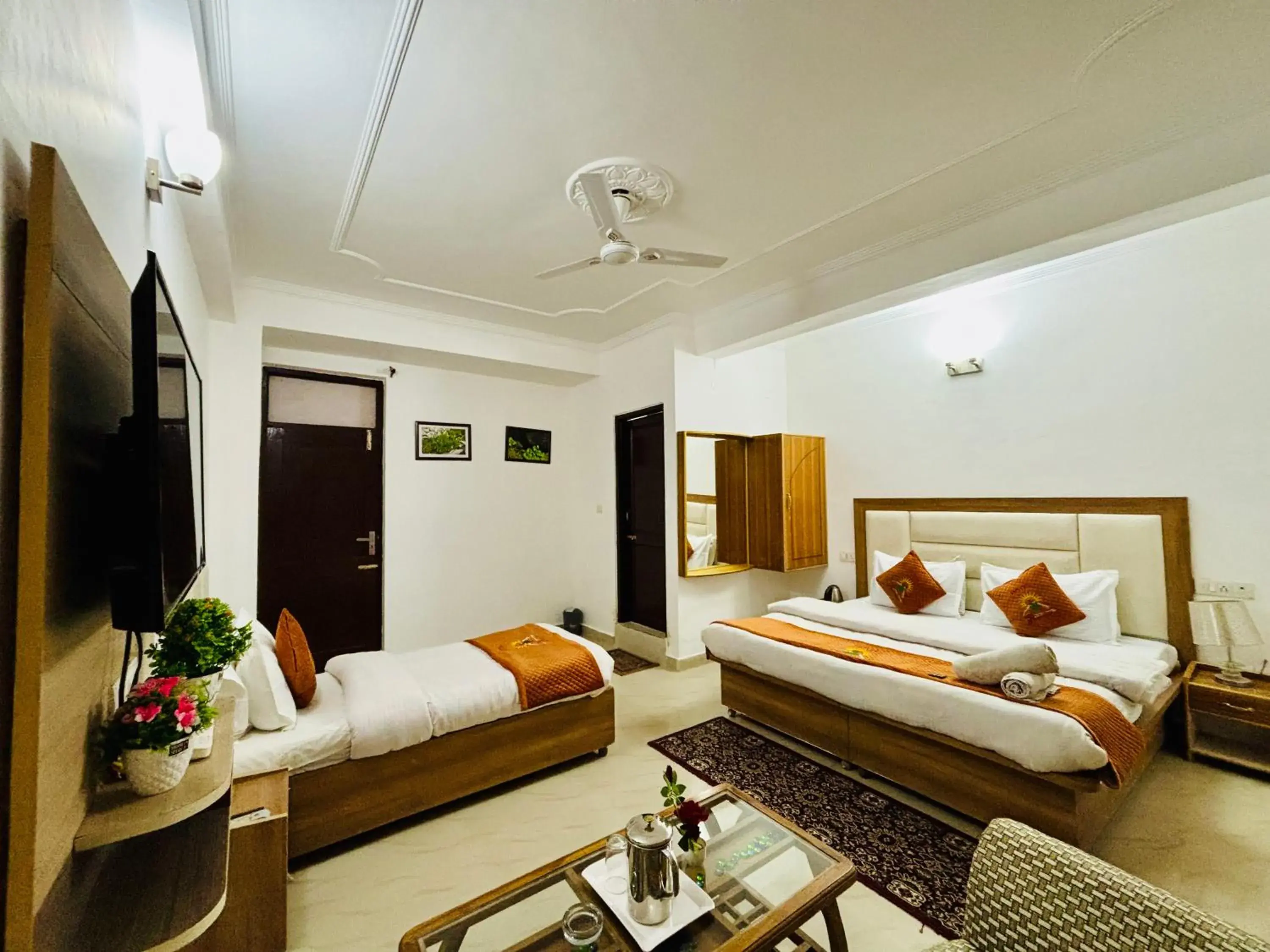 Deluxe Triple Room in Hotel Kumar Residency Deluxe Triple Room in Hotel Kumar Residency