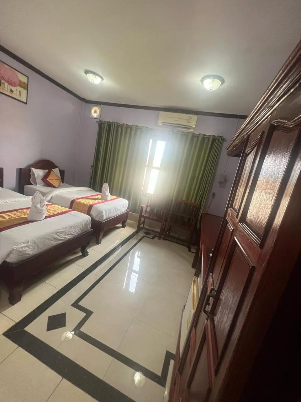 Bed in Khampaseuth Hotel