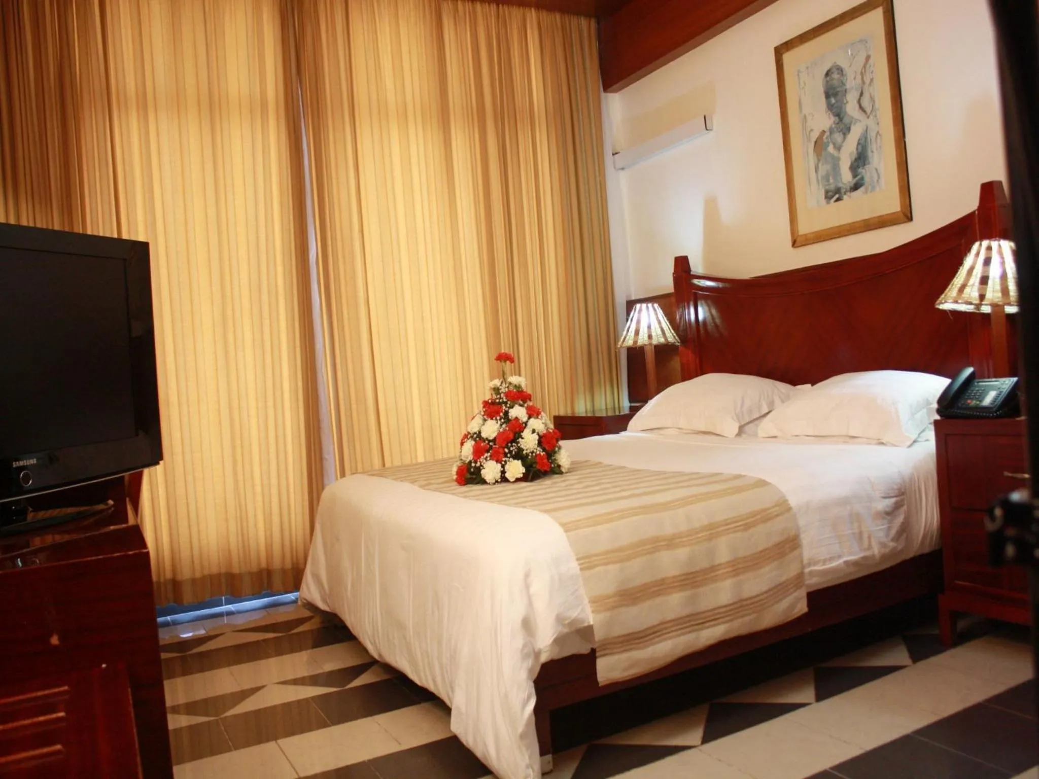 Bed in Peacock Hotel