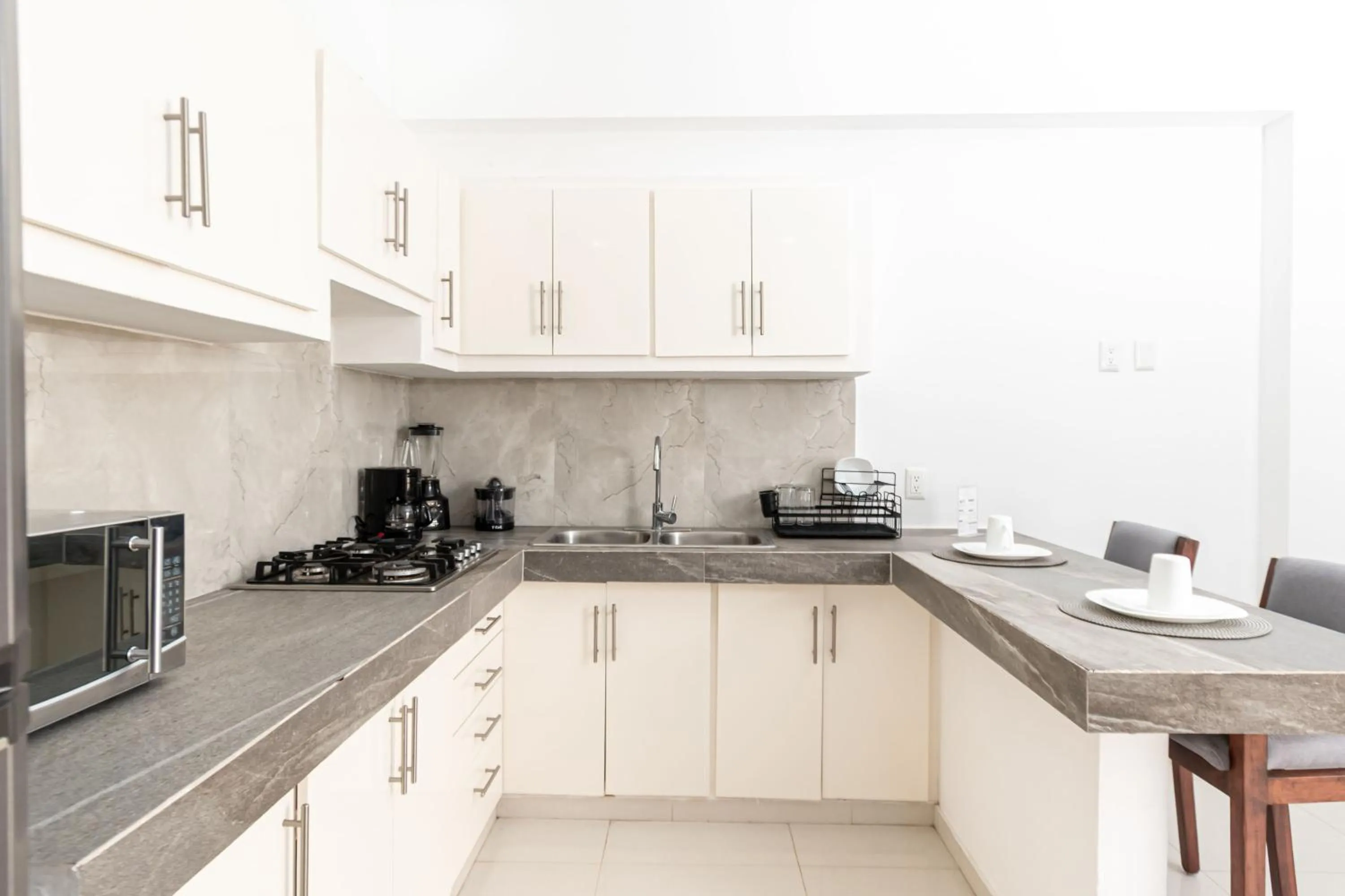 kitchen in Safiro Suites Guayabitos Apartments - Adults Only