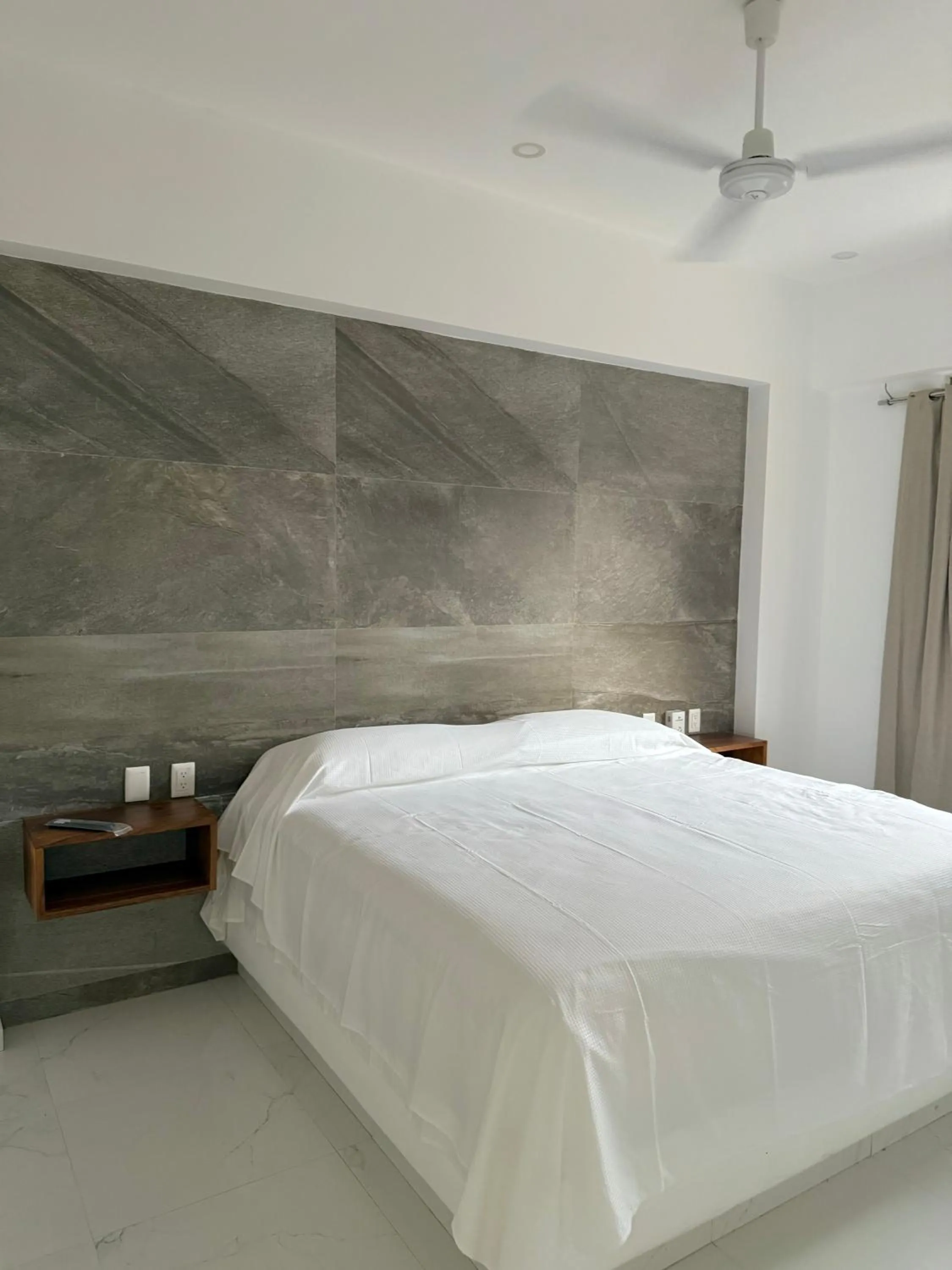 Bed in Safiro Suites Guayabitos Apartments - Adults Only