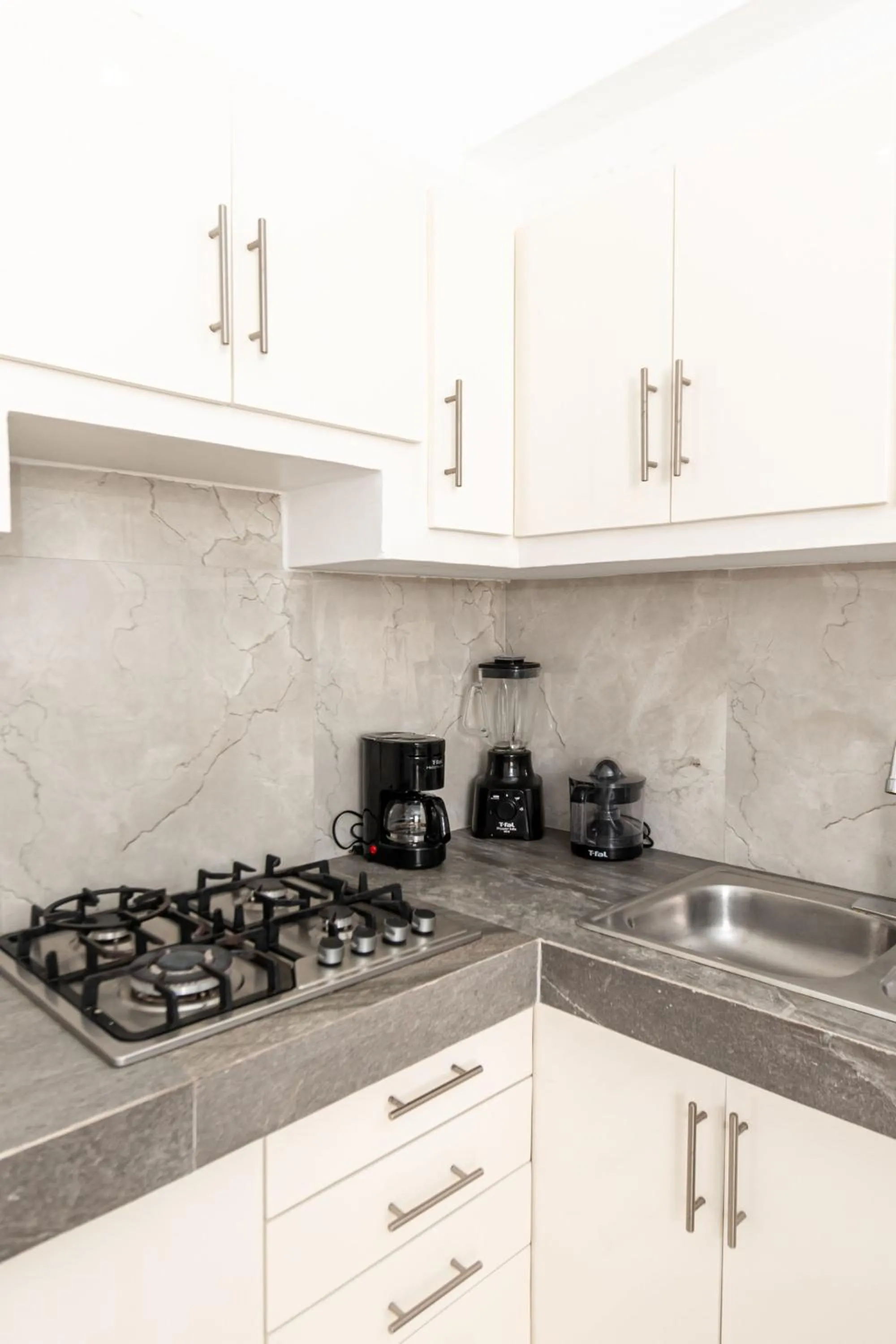 Kitchen or kitchenette in Safiro Suites Guayabitos Apartments - Adults Only