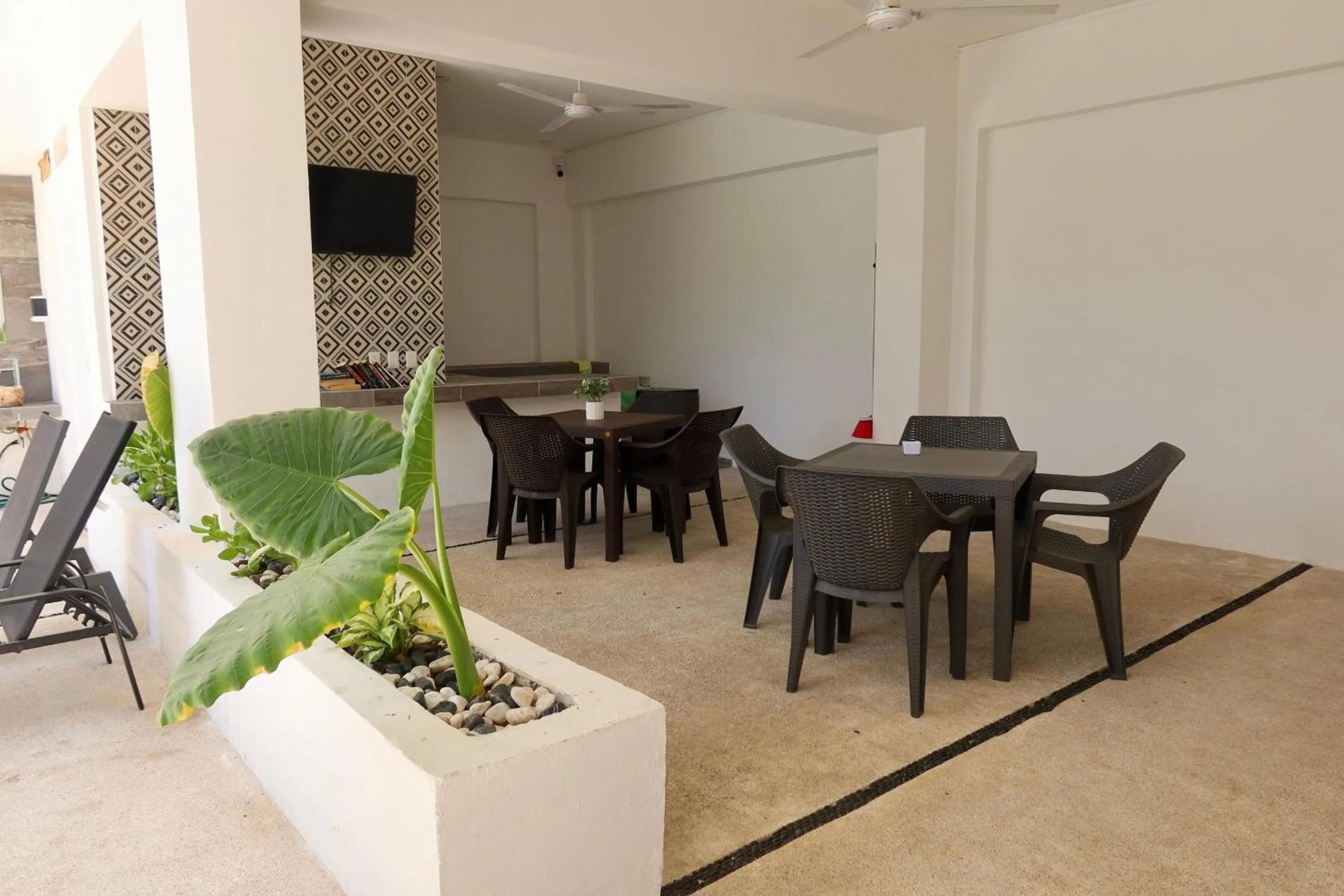Communal lounge/ TV room in Safiro Suites Guayabitos Apartments - Adults Only