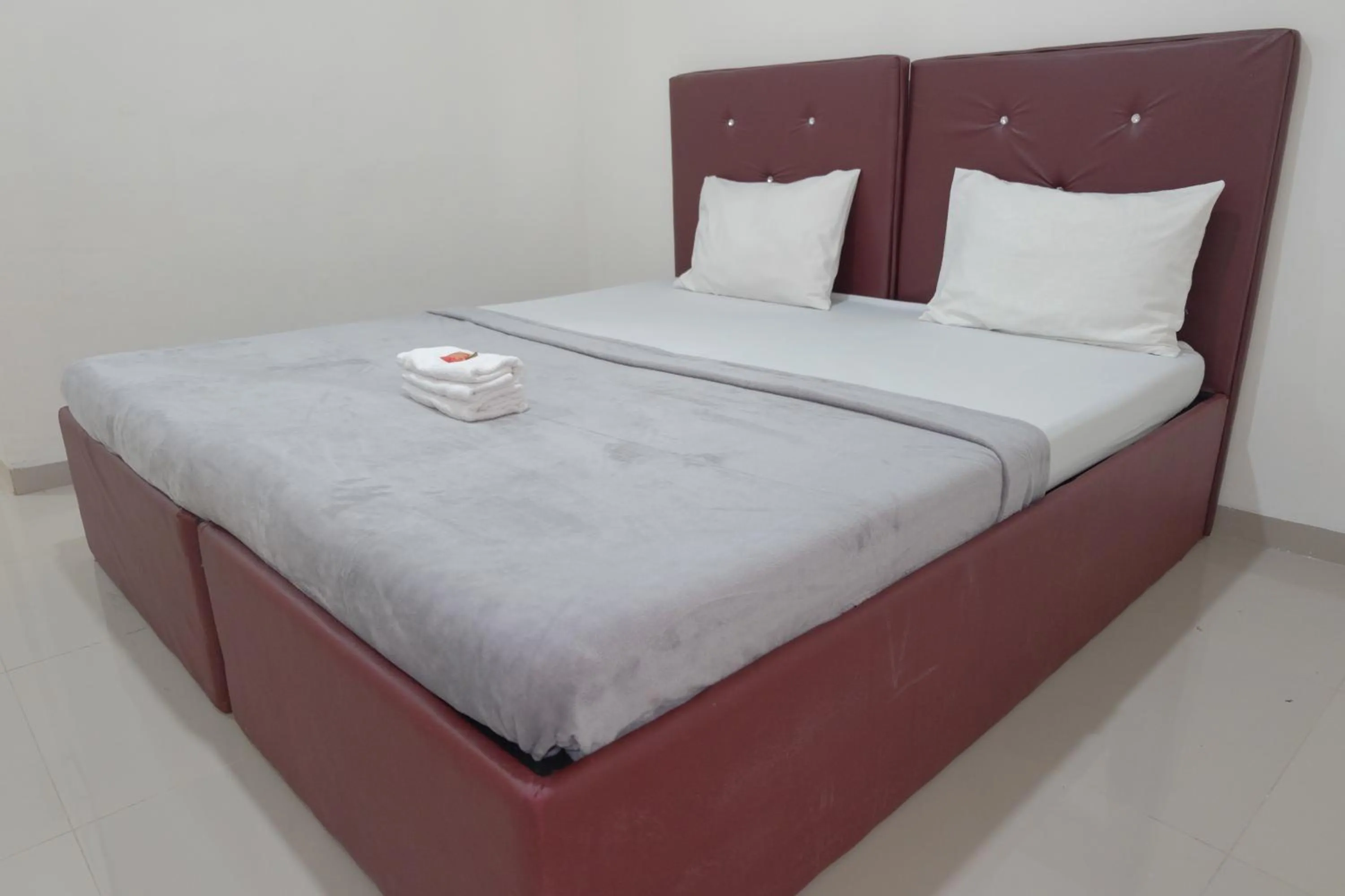 Bed in BI Hotel Kisaran