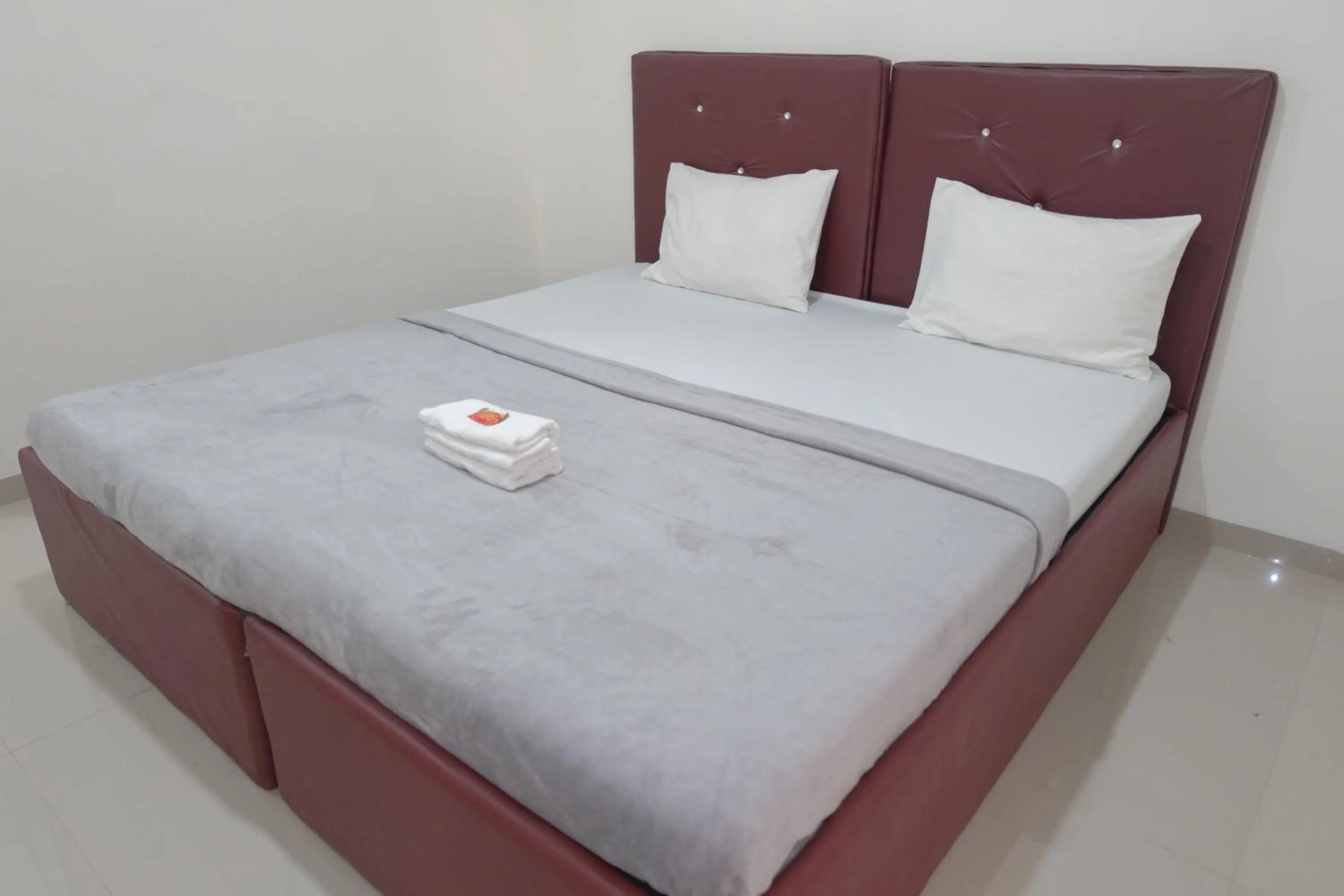 Bed in BI Hotel Kisaran