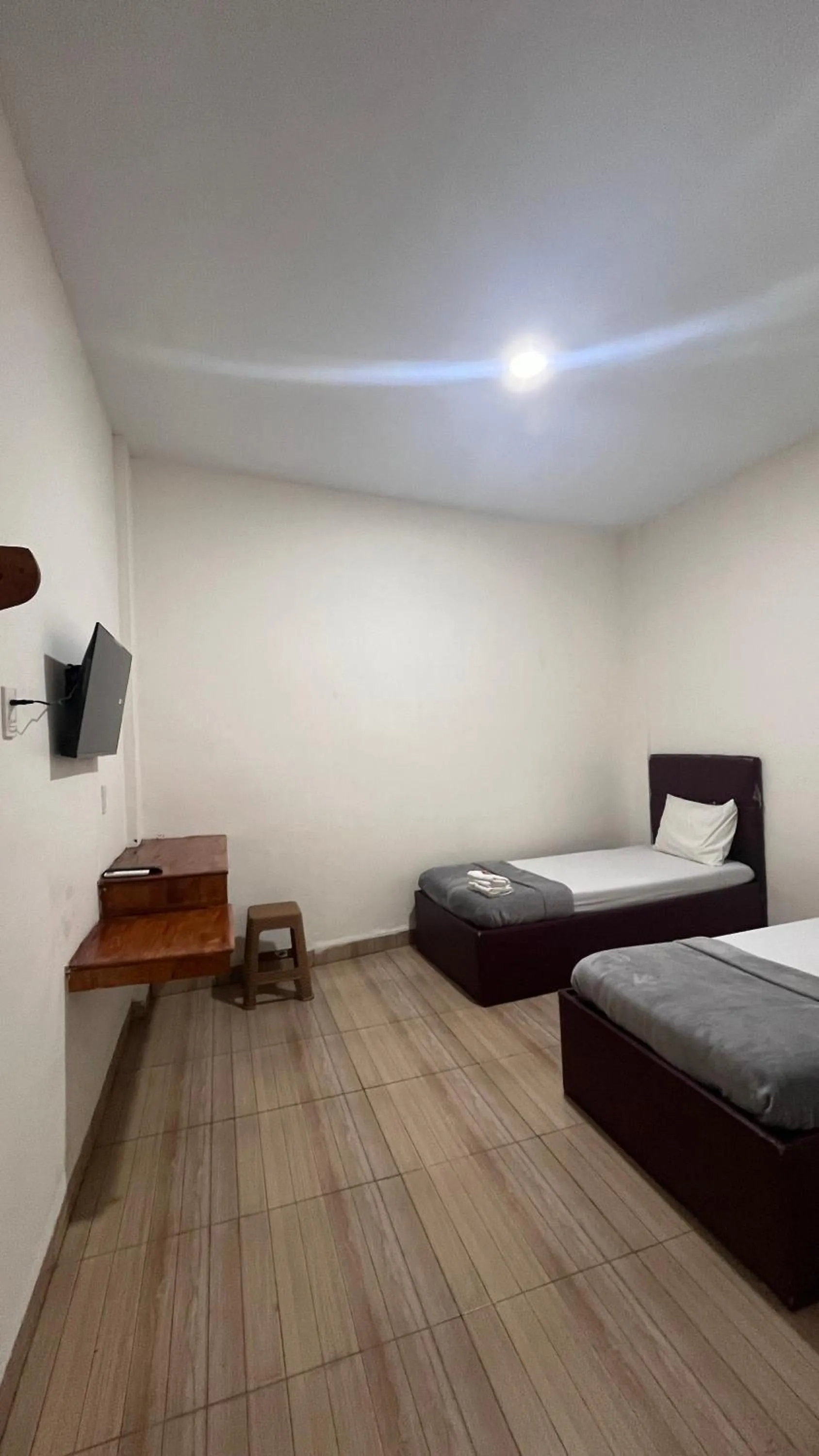 Bed in BI Hotel Kisaran